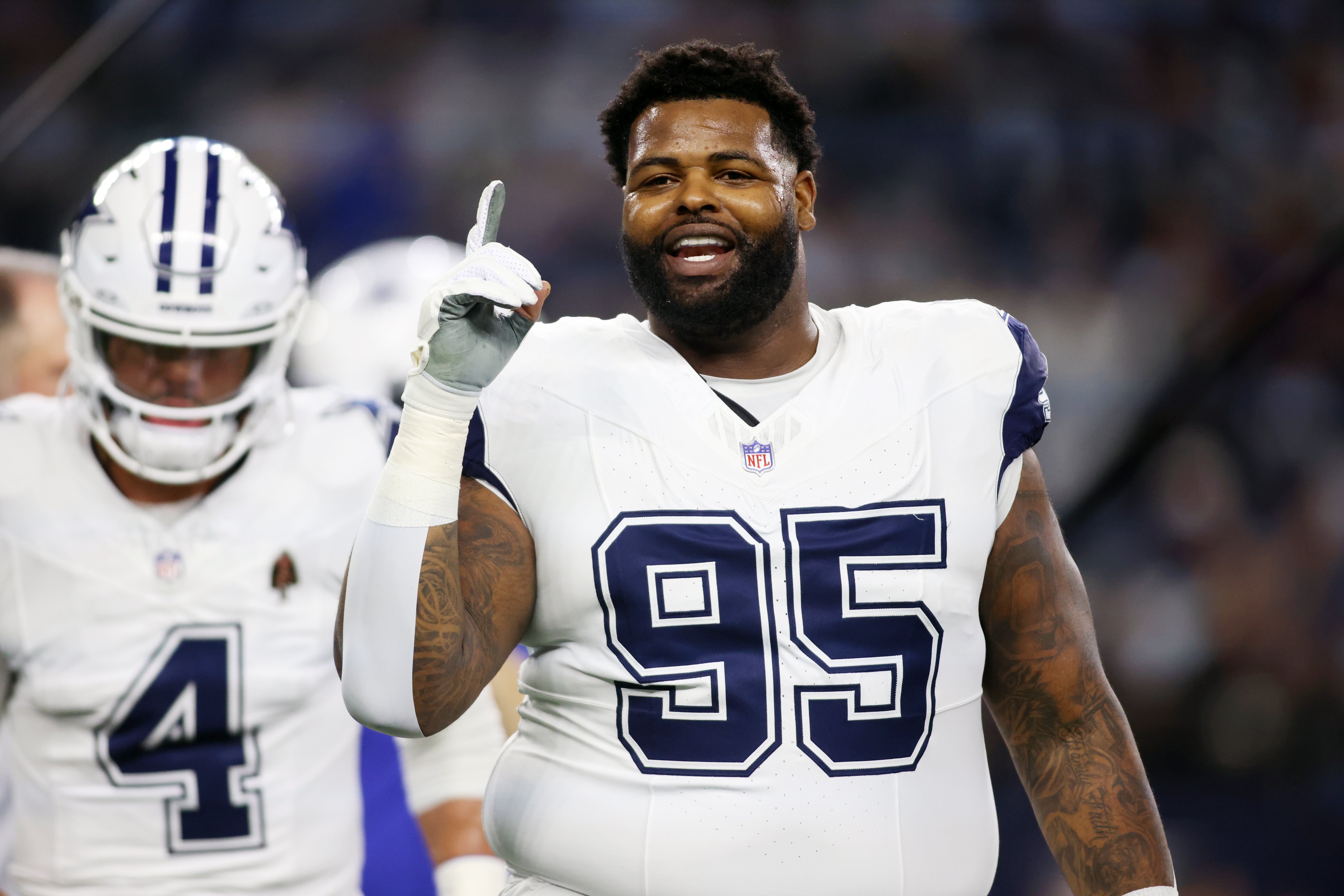 Dallas Cowboys defensive tackle Johnathan Hankins (95) smiles as he walks off the field before the game against the Philadelphia Eagles at AT&T Stadium.