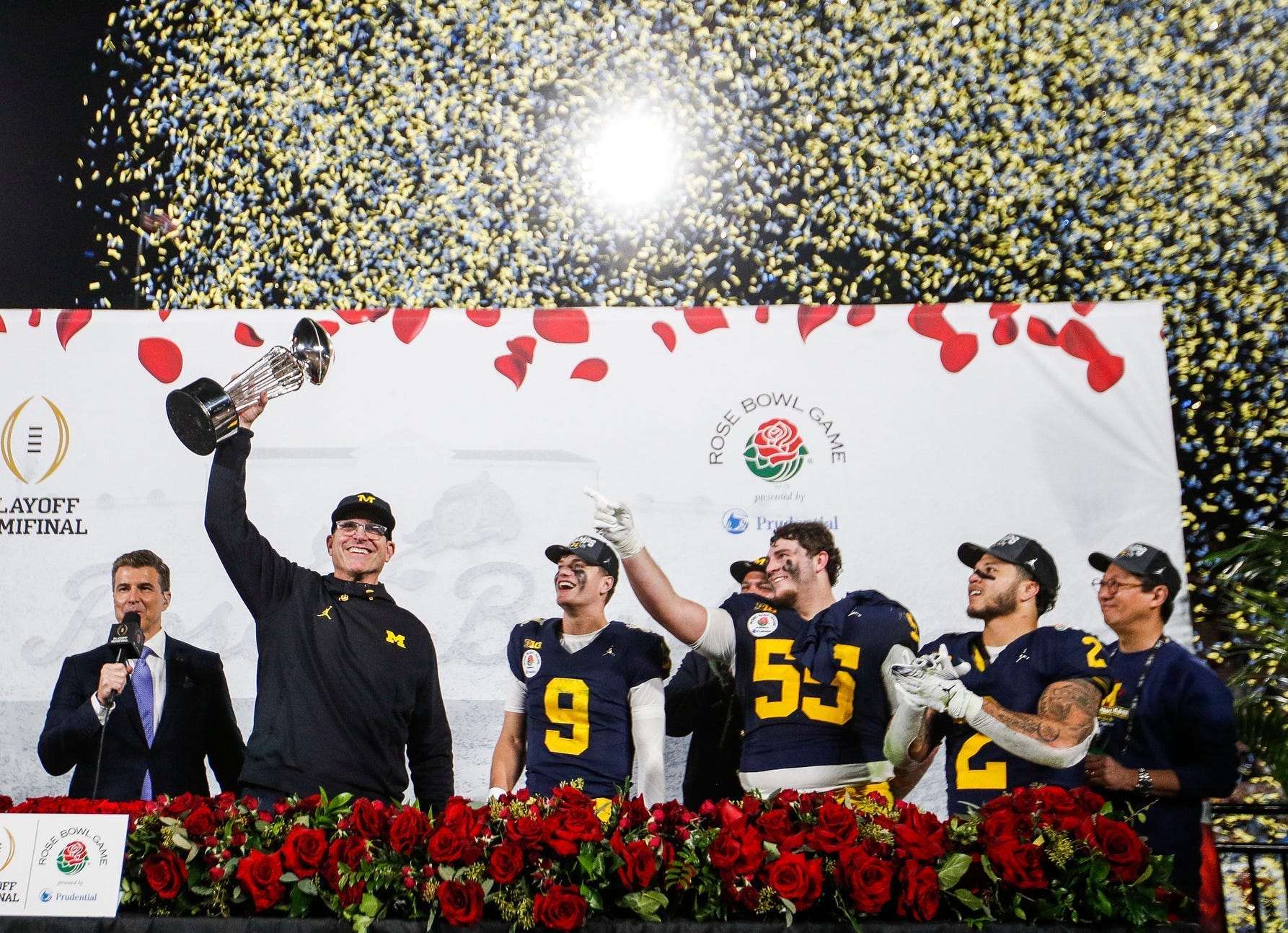 an. 1, 2024: Michigan head coach Jim Harbaugh lifts up the Rose Bowl trophy after a 27-20 win over Alabama in the College Football Playoff semifinal at the Rose Bowl in Pasadena, California.