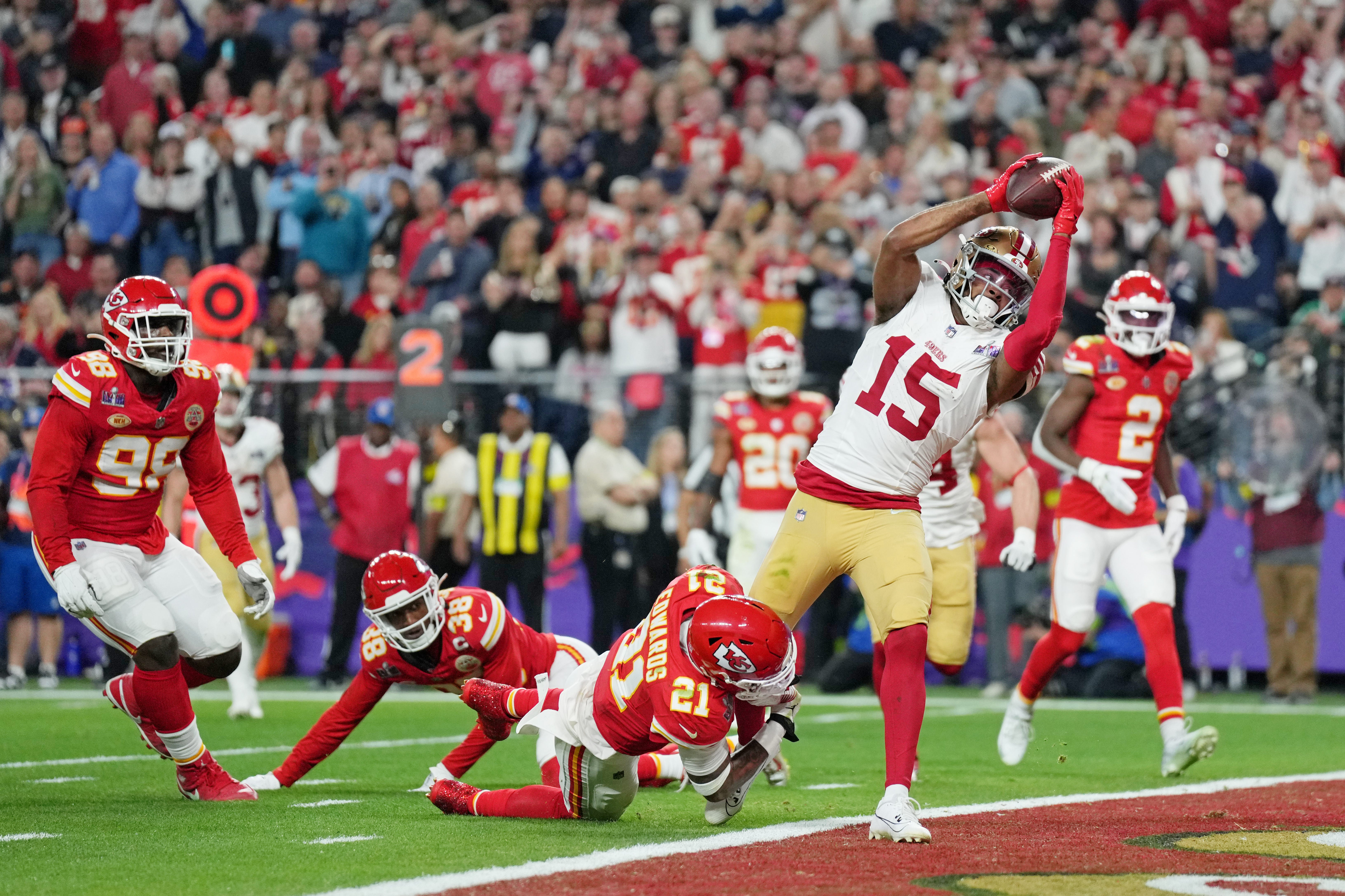 Feb 11, 2024; Paradise, Nevada, USA; San Francisco 49ers wide receiver Jauan Jennings (15) makes a catch for a touchdown against the Kansas City Chiefs during the fourth quarter of Super Bowl LVIII at Allegiant Stadium.