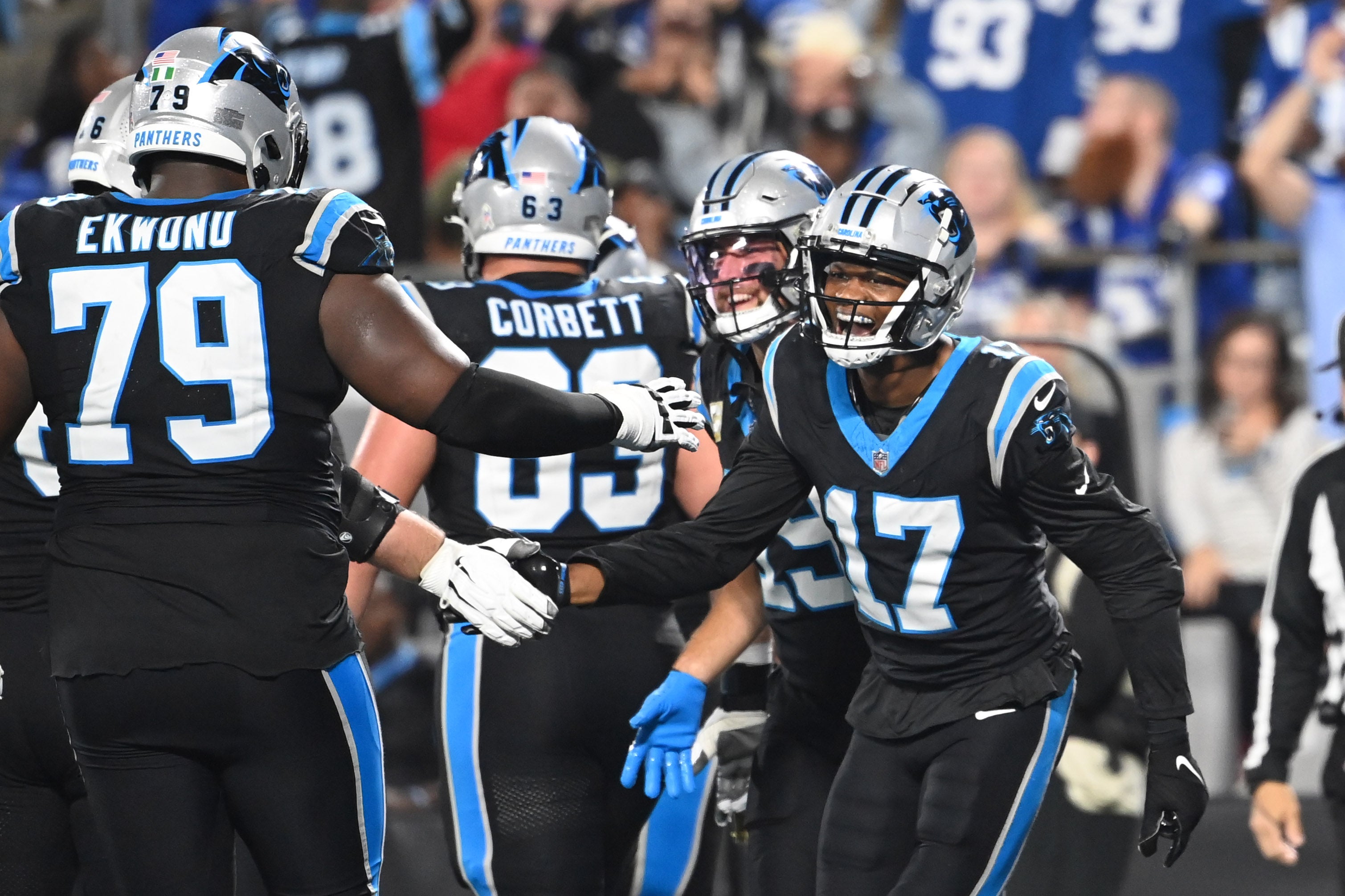 Nov 5, 2023; Charlotte, North Carolina, USA; Carolina Panthers wide receiver DJ Chark Jr. (17) celebrates with offensive tackle Ikem Ekwonu (79) after scoring a touchdown in the third quarter at Bank of America Stadium. Mandatory Credit: Bob Donnan-USA TODAY Sports