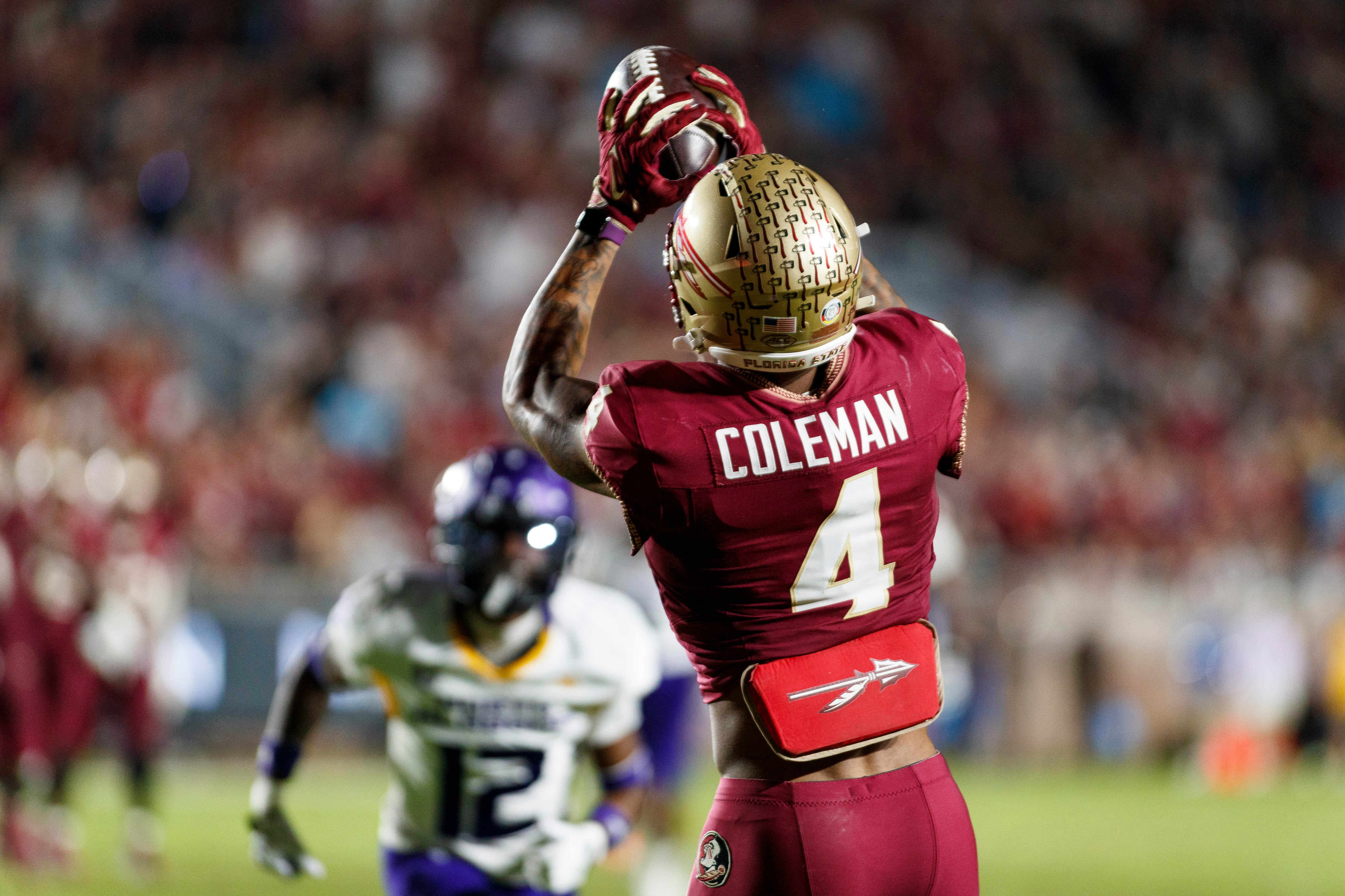 Nov 18, 2023; Tallahassee, Florida, USA; Florida State Seminoles wide receiver Keon Coleman (4) catches a ball in the endzone to score a touchdown against the North Alabama Lions during the third quarter at Doak S. Campbell Stadium.