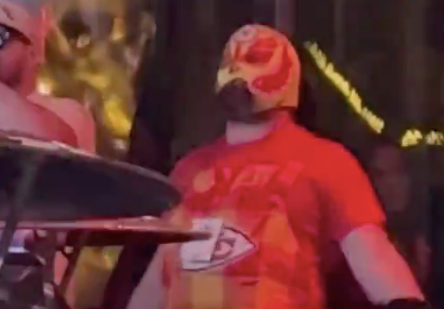 Jason Kelce parties in a Kansas City wrestling mask after the Super Bowl.
