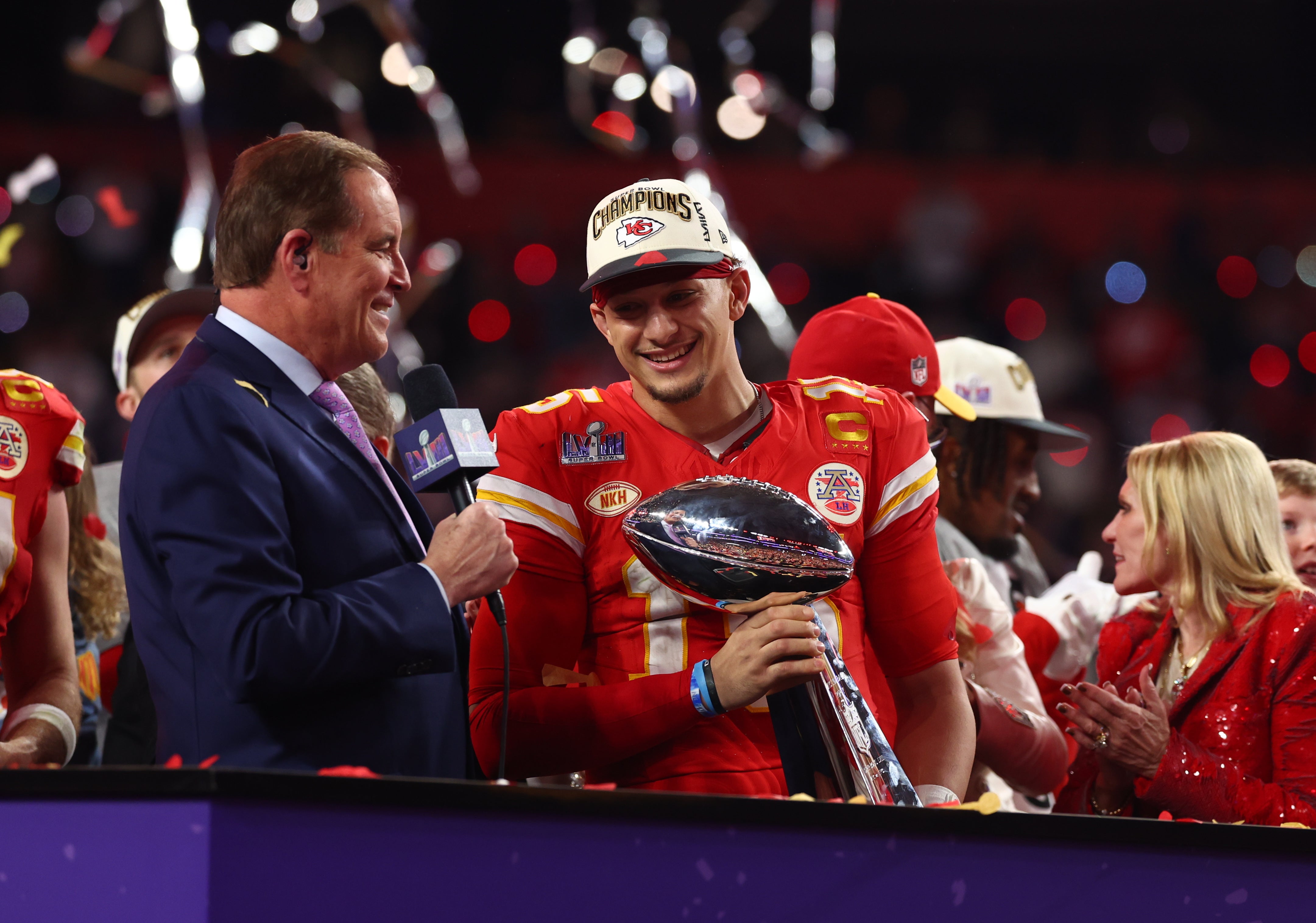 Feb 11, 2024; Paradise, Nevada, USA; Kansas City Chiefs quarterback Patrick Mahomes (15) celebrates with the Vince Lombardi Trophy after defeating the San Francisco 49ers in Super Bowl LVIII at Allegiant Stadium.