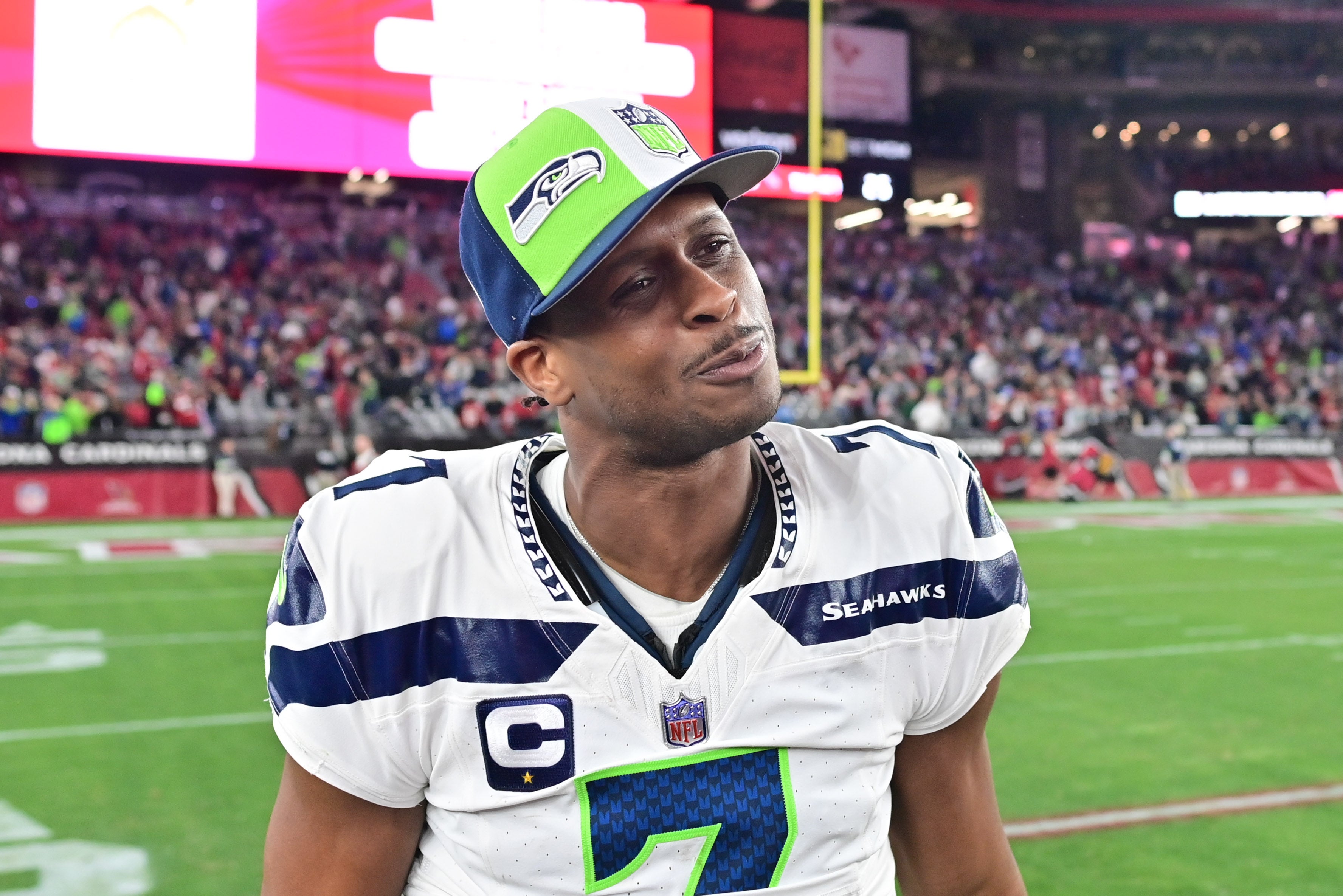Jan 7, 2024; Glendale, Arizona, USA; Seattle Seahawks quarterback Geno Smith (7) looks on after beating the Arizona Cardinals at State Farm Stadium.