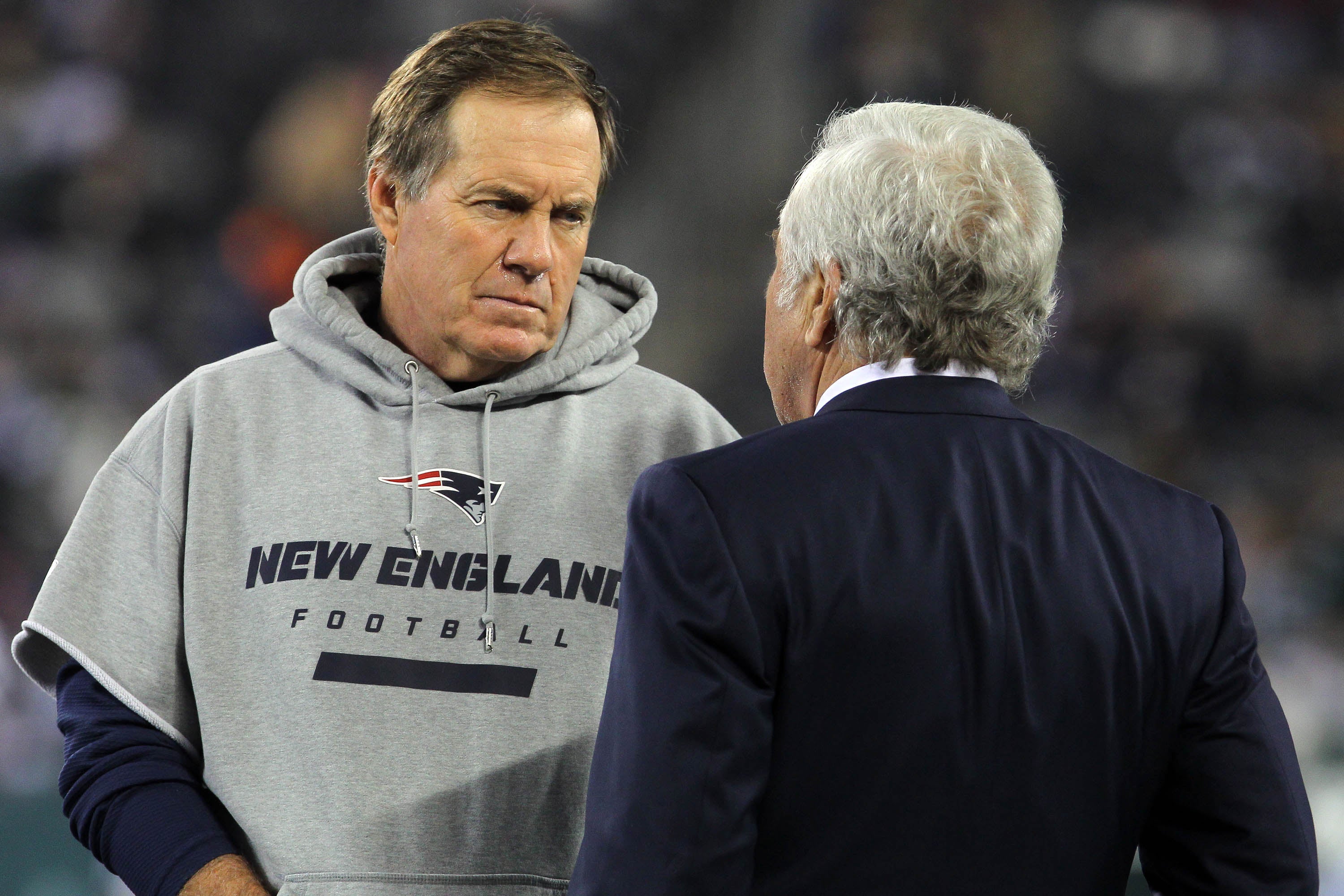 Nov 22, 2012; East Rutherford, NJ, USA; New England Patriots head coach Bill Belichick (left) talks with owner Robert Kraft prior to the game against the New York Jets on Thanksgiving at Met Life Stadium