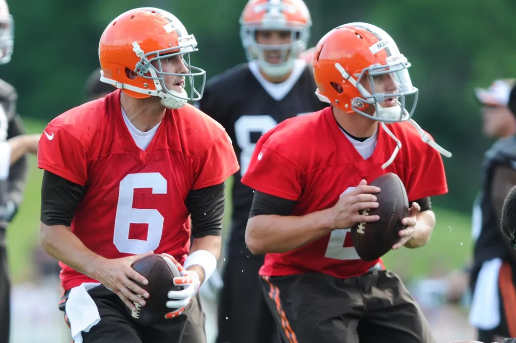 Cleveland Browns quarterback Brian Hoyer (6) and Cleveland Browns quarterback Johnny Manziel (2) during training camp at the Cleveland Browns training facility.