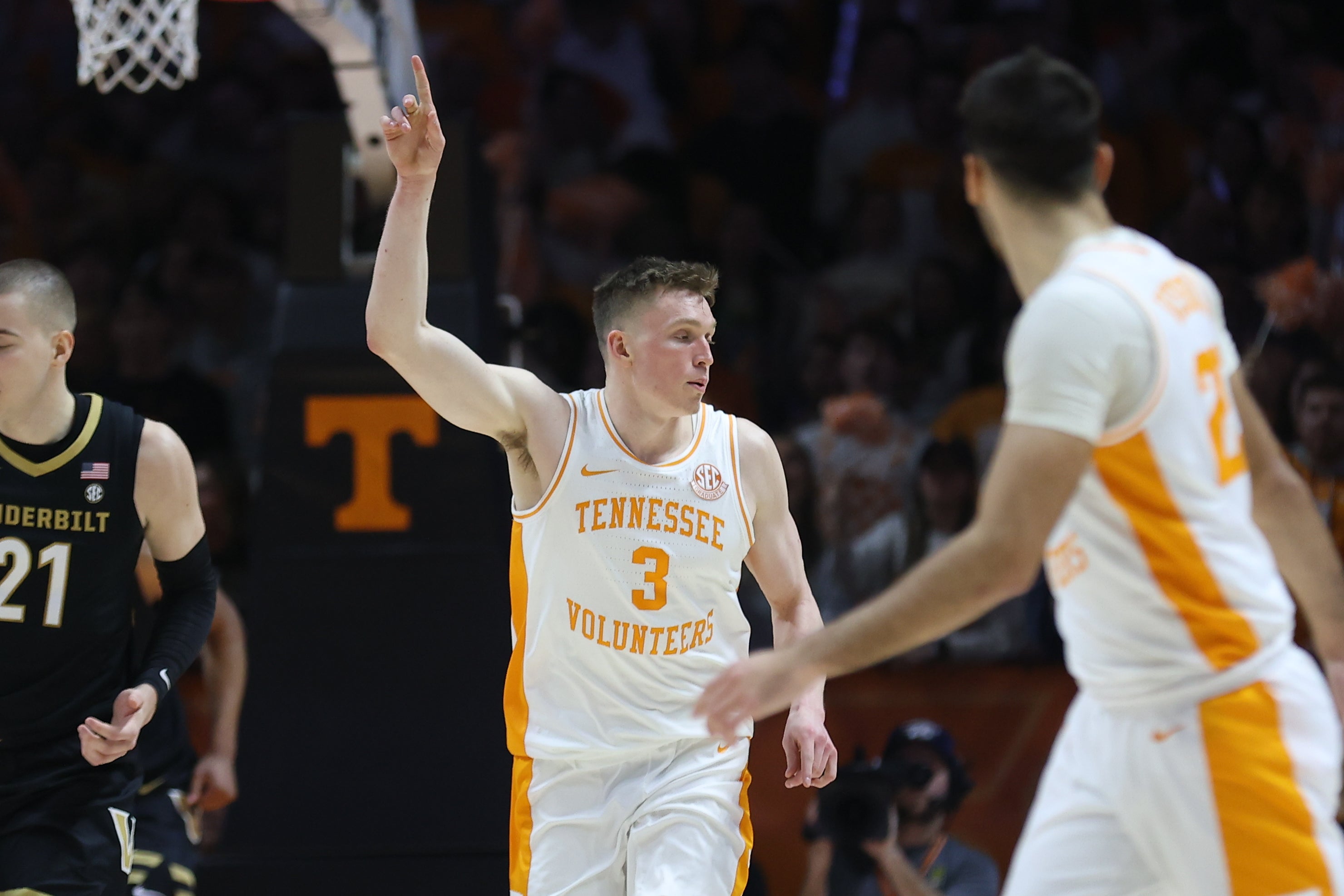 Feb 17, 2024; Knoxville, Tennessee, USA; Tennessee Volunteers guard Dalton Knecht (3) reacts after scoring a three pointer against the Vanderbilt Commodores during the first half at Thompson-Boling Arena at Food City Center.