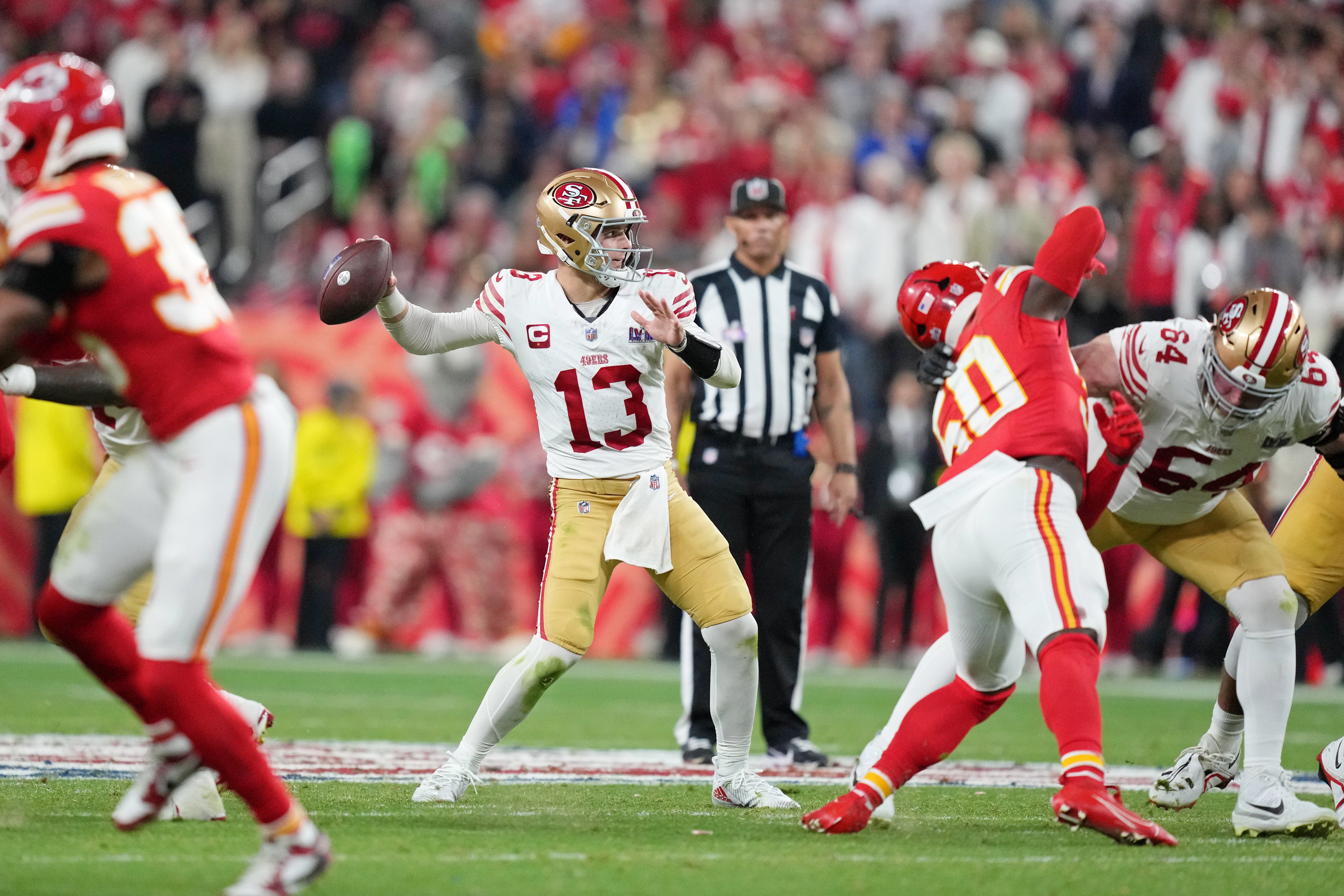 Feb 11, 2024; Paradise, Nevada, USA; San Francisco 49ers quarterback Brock Purdy (13) passes the ball against the Kansas City Chiefs during the fourth quarter of Super Bowl LVIII at Allegiant Stadium.