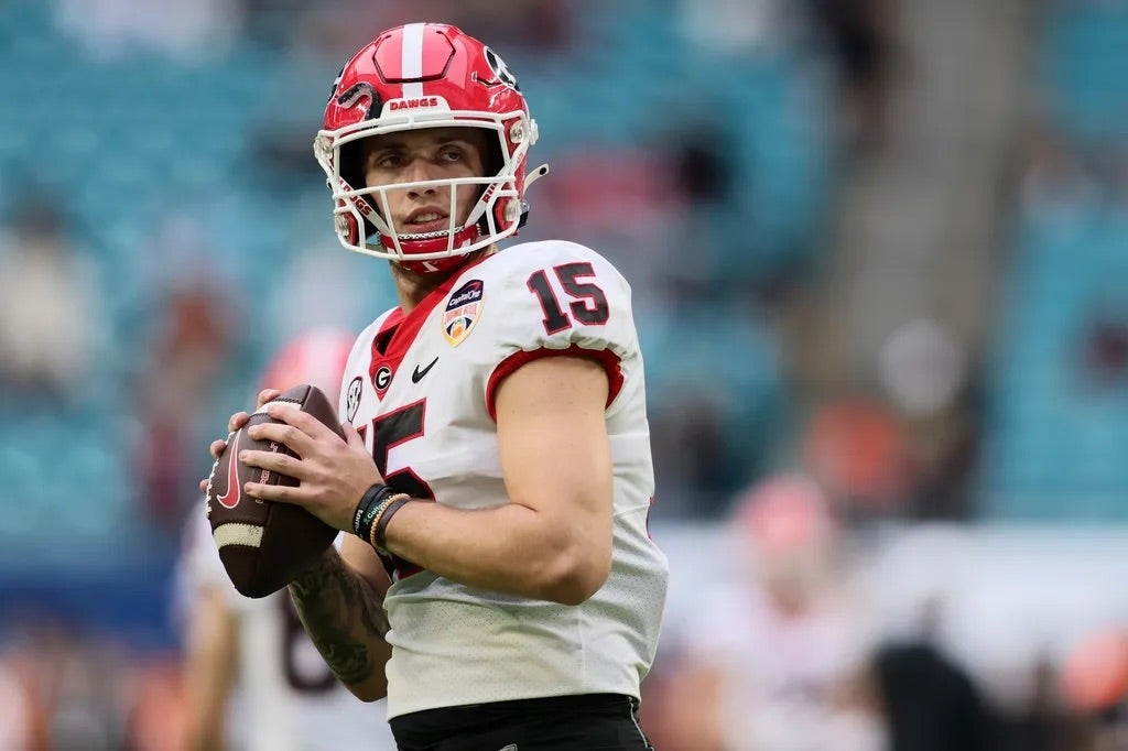 Georgia Bulldogs quarterback Carson Beck (15) practices before the game against the Florida State Seminoles for the 2023 Orange Bowl at Hard Rock Stadium.
