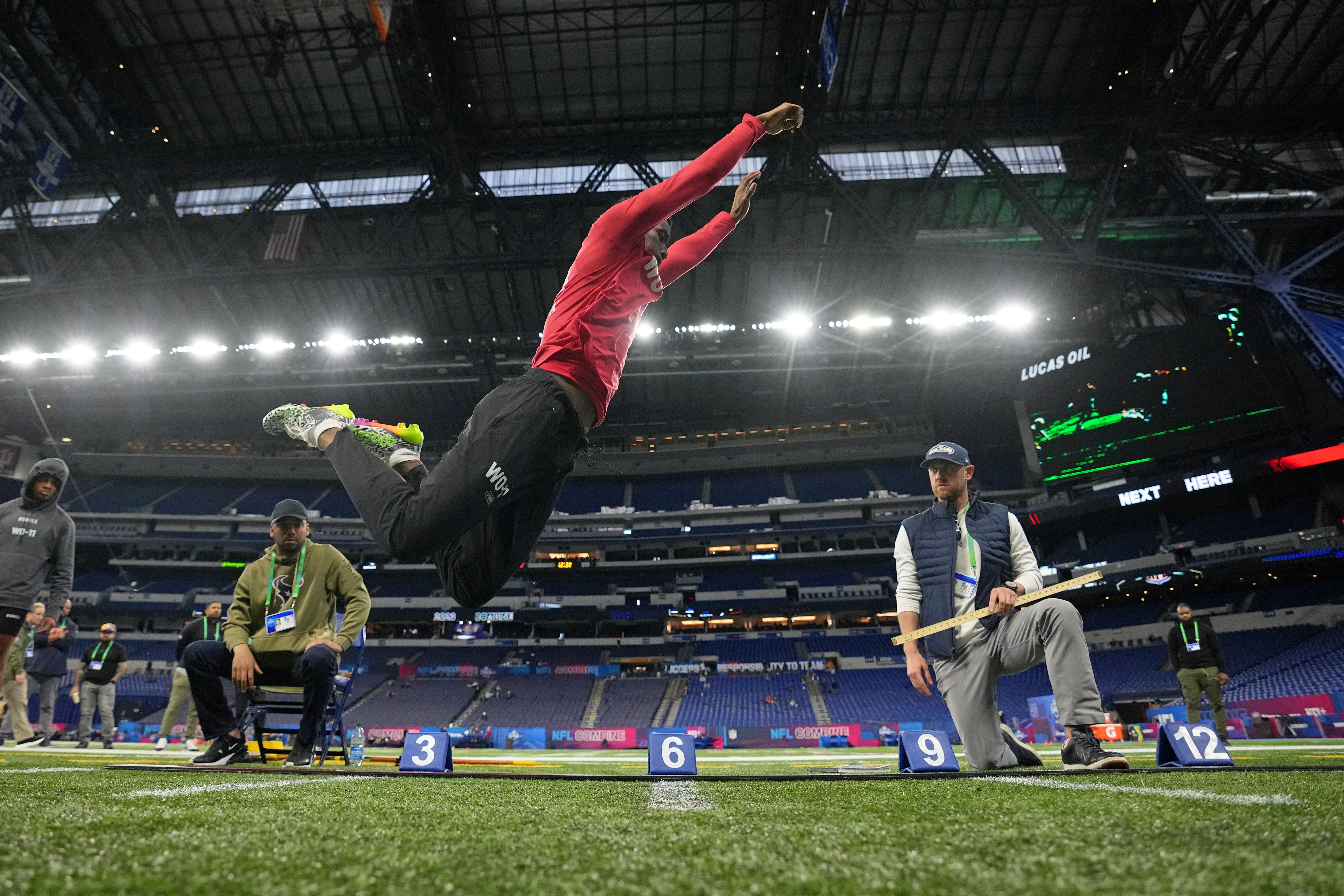 Mar 4, 2023; Indianapolis, IN, USA; Southern California wide receiver Jordan Addison (WO01) participates in the broad jump at Lucas Oil Stadium.