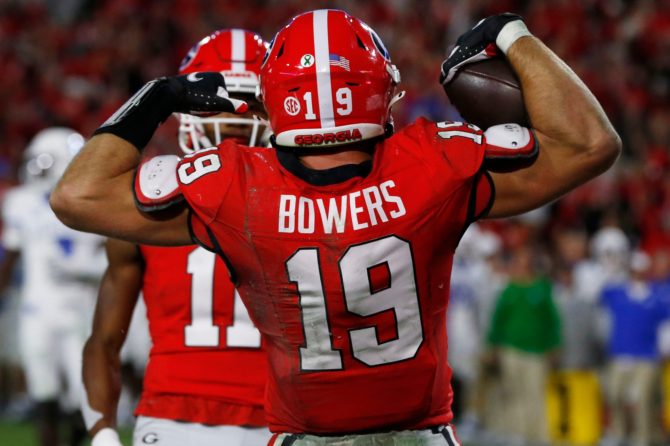 Georgia tight end Brock Bowers (19) celebrates after scoring a touchdown during the second half of a NCAA college football game against Kentucky in Athens, Ga., on Saturday, Oct. 7, 2023.