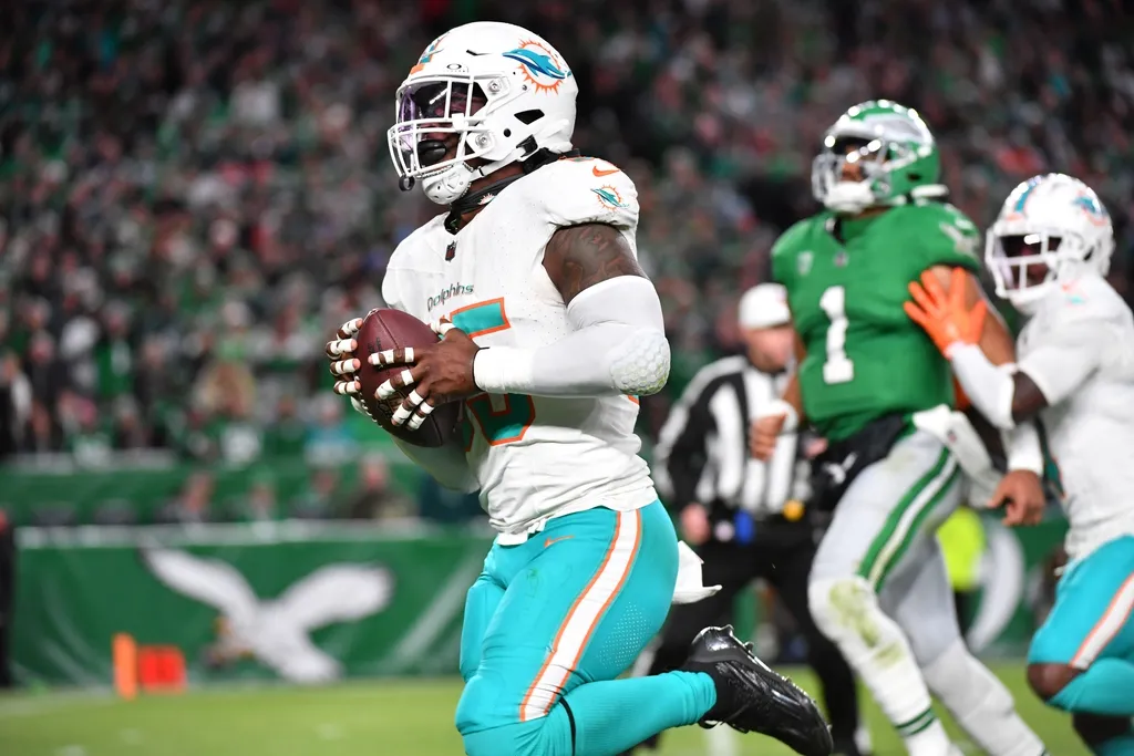 Miami Dolphins linebacker Jerome Baker (55) returns an interception for a touchdown during the third quarter against the Philadelphia Eagles at Lincoln Financial Field.