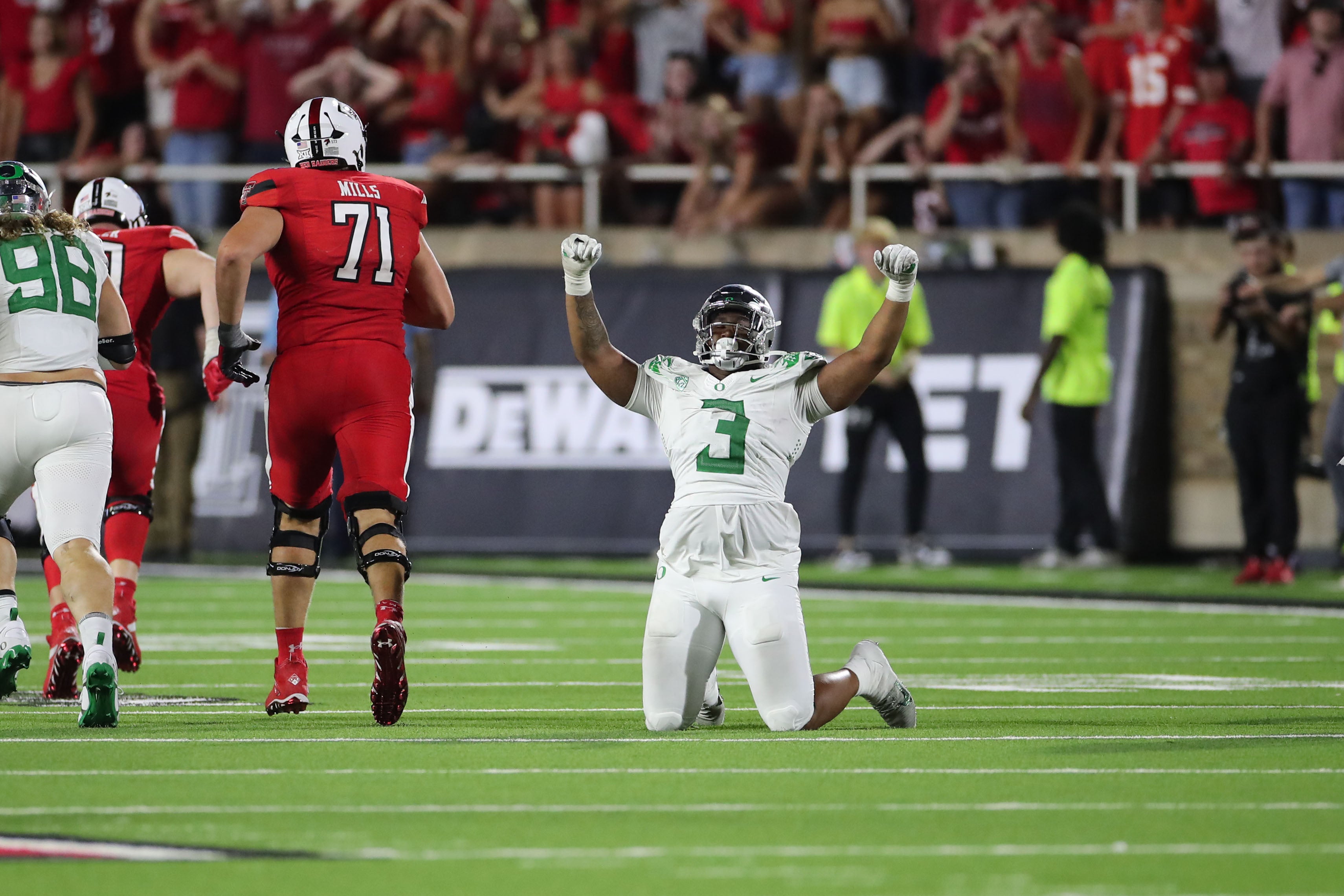 Sep 9, 2023; Lubbock, Texas, USA; Oregon Ducks defensive end Brandon Dorlus (3) reacts at the end of the game after an interception of the Texas Tech Red Raiders at Jones AT&T Stadium and Cody Campbell Field. Mandatory Credit: Michael C. Johnson-USA TODAY Sports