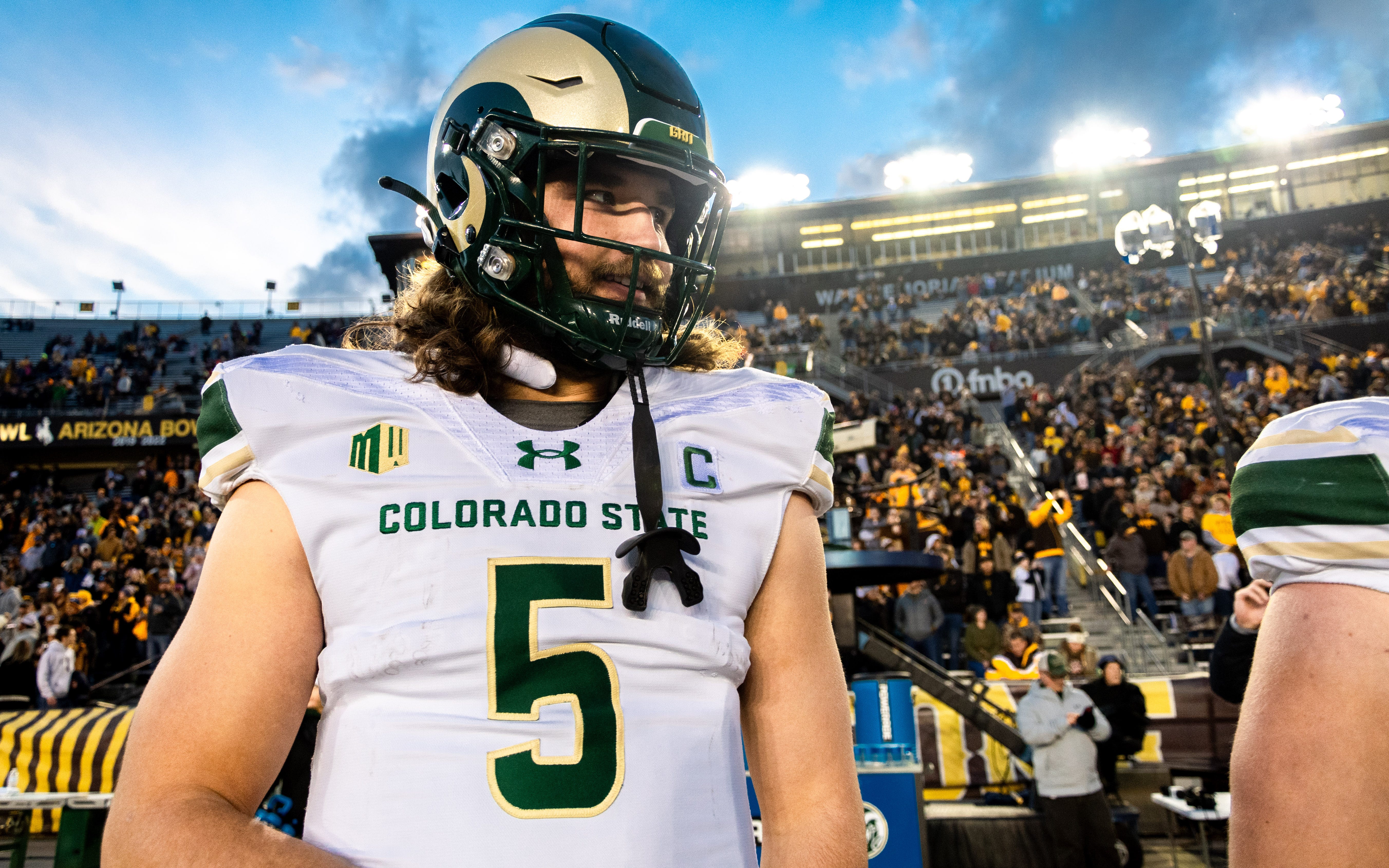 CSU football's junior tight end Dallin Holker takes the field as one of the Rams' captains for the Border War against Wyoming at War Mermorial Stadium on Friday Nov. 3, 2023 in Laramie, Wyo.