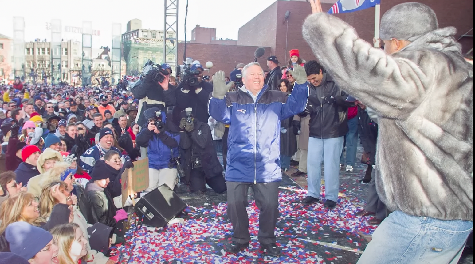 Ty Law and Robert Kraft dancing during the Super Bowl XXXVI parade