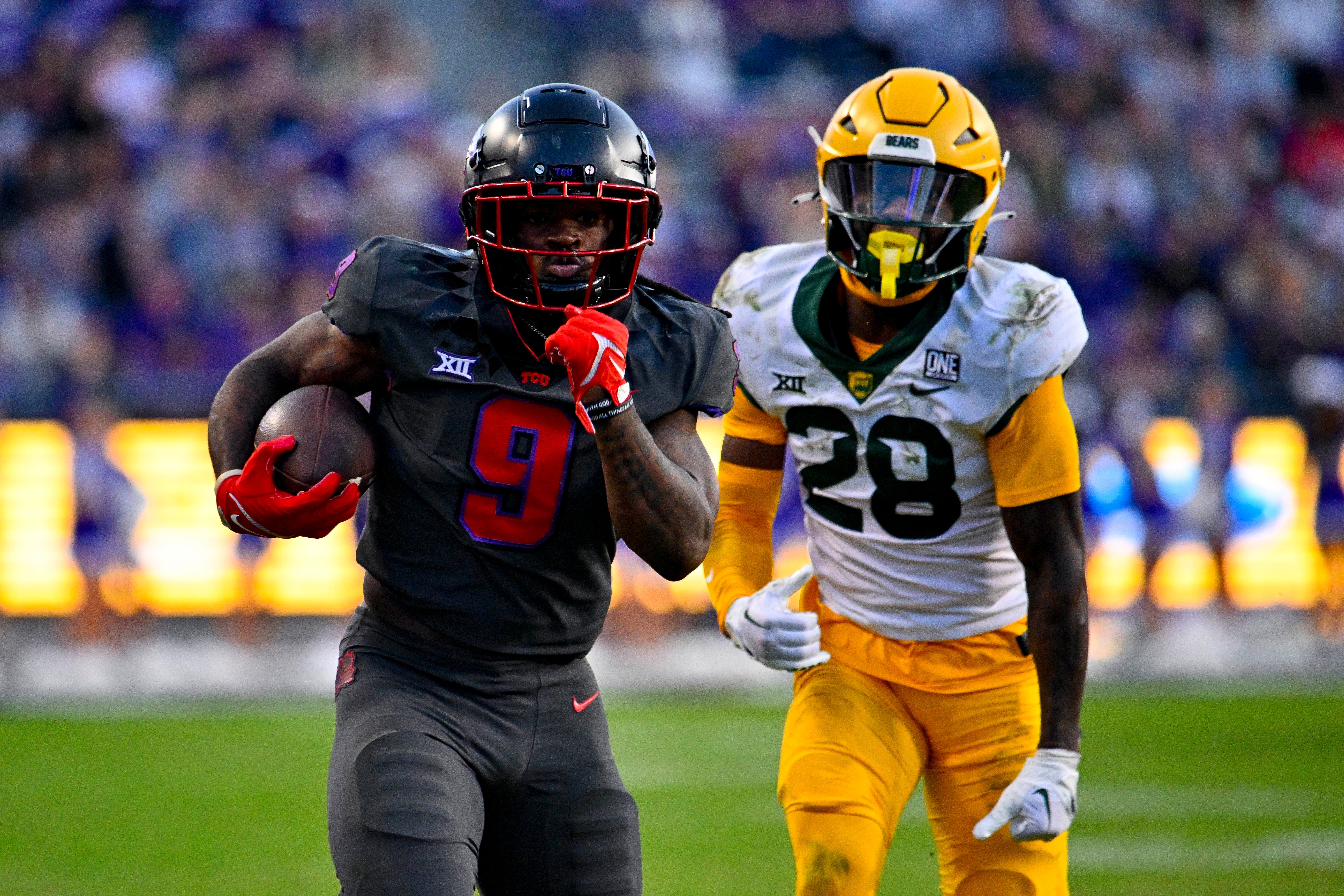 Nov 18, 2023; Fort Worth, Texas, USA; TCU Horned Frogs running back Emani Bailey (9) runs for a touchdown against the Baylor Bears during the second half at Amon G. Carter Stadium. Mandatory Credit: Jerome Miron-USA TODAY Sports