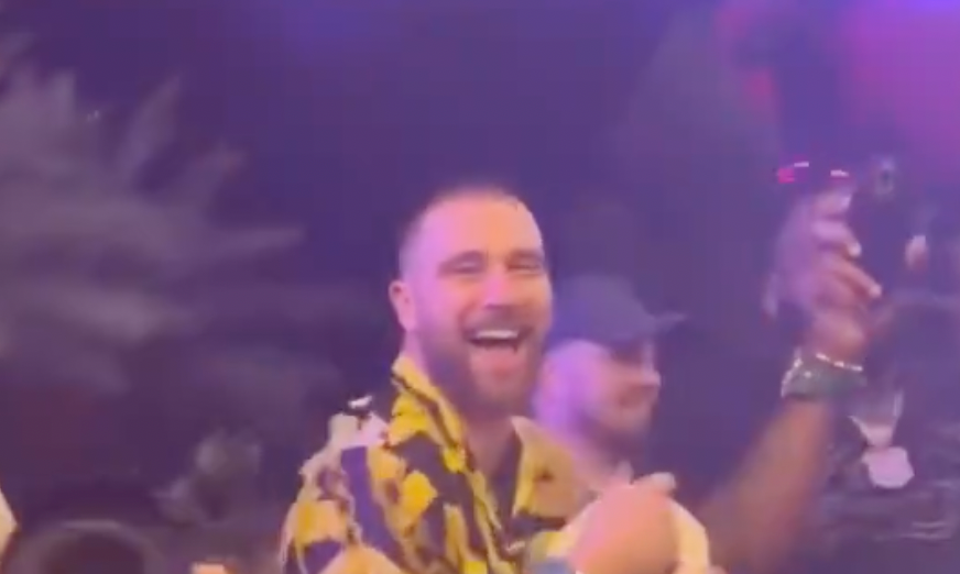Travis Kelce dances to Taylor Swift's Love Story in Las Vegas with Chiefs teammates.
