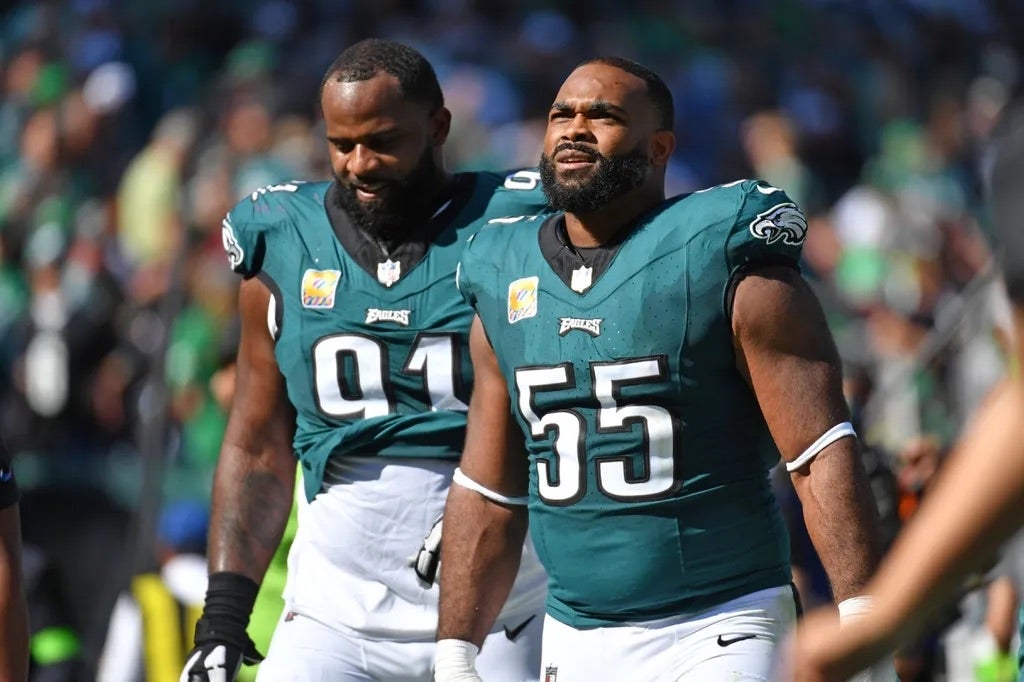 Philadelphia Eagles defensive tackle Fletcher Cox (91) and defensive end Brandon Graham (55) against the Washington Commanders at Lincoln Financial Field.