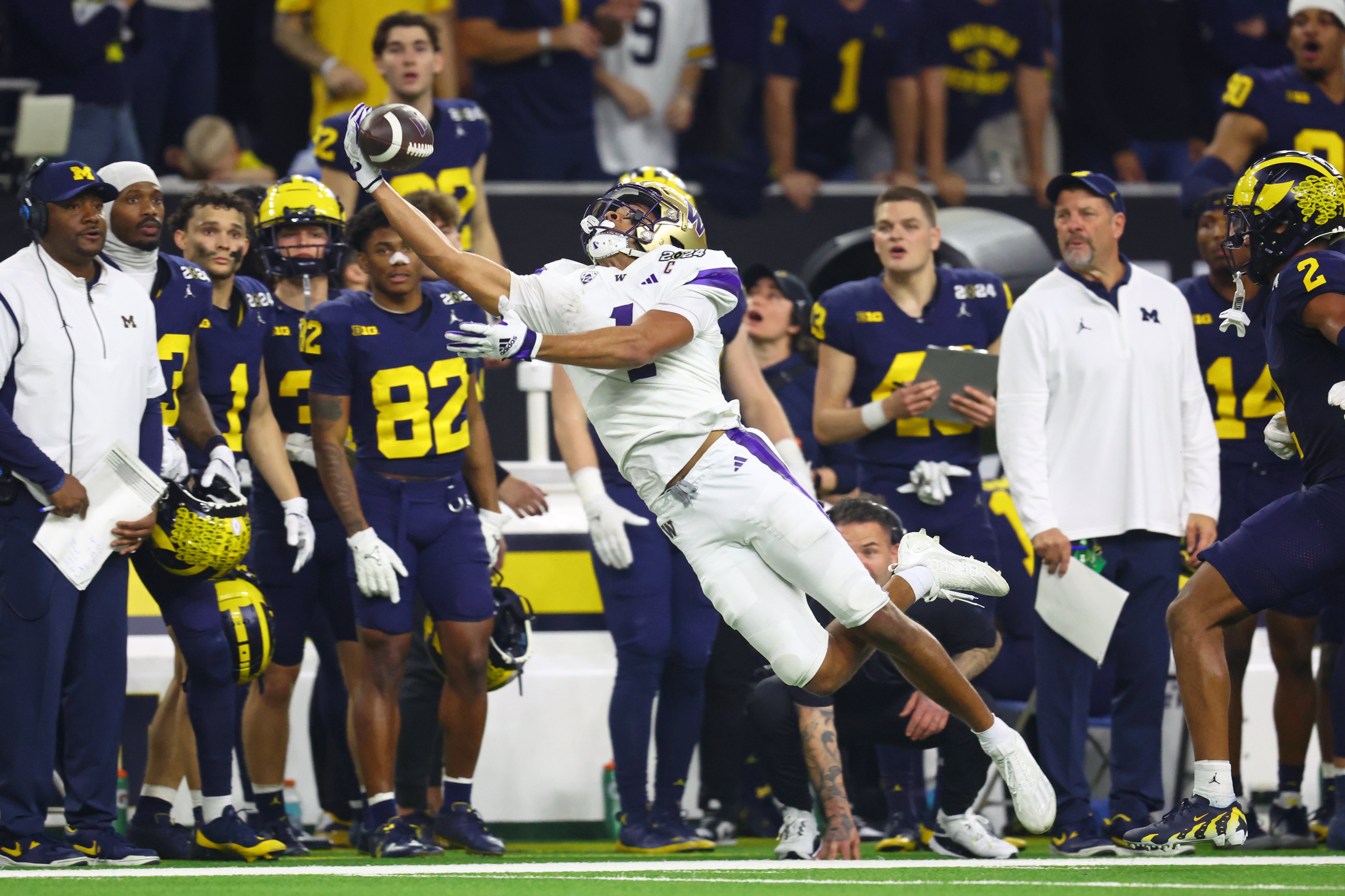 Jan 8, 2024; Houston, TX, USA; Washington Huskies wide receiver Rome Odunze (1) is unable to make a catch against the Michigan Wolverines during the third quarter in the 2024 College Football Playoff national championship game at NRG Stadium.