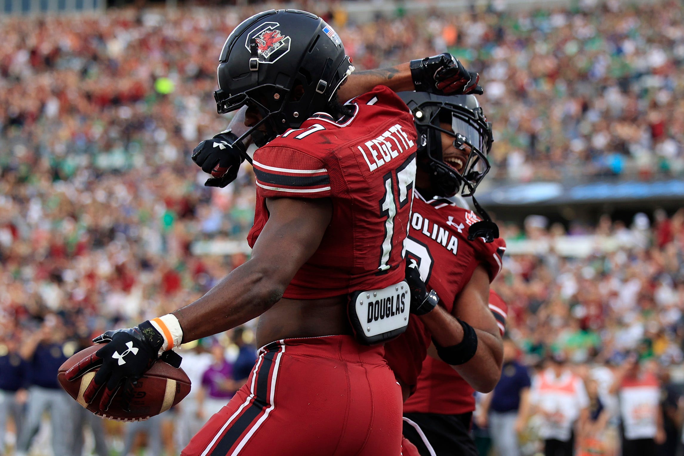 South Carolina Gamecocks wide receiver Xavier Legette (17) is congratulated by teammate wide receiver Antwane Wells Jr. (3) for his touchdown score during the first quarter of the TaxSlayer Gator Bowl of an NCAA college football game Friday, Dec. 30, 2022 at TIAA Bank Field in Jacksonville. The Notre Dame Fighting Irish held off the South Carolina Gamecocks 45-38. [Corey Perrine/Florida Times-Union] Jki 123022 Ncaaf Nd Usc Cp 74