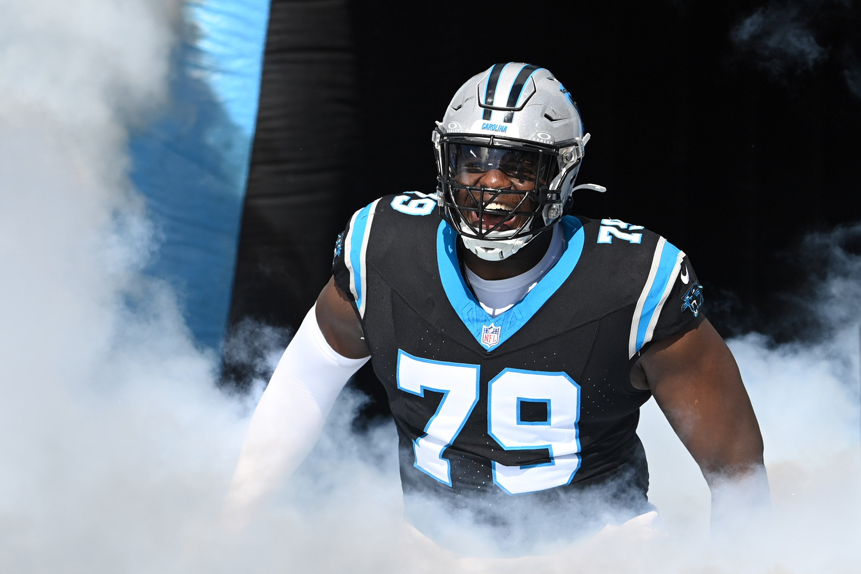 Carolina Panthers offensive tackle Ikem Ekwonu (79) runs on to the field at Bank of America Stadium.