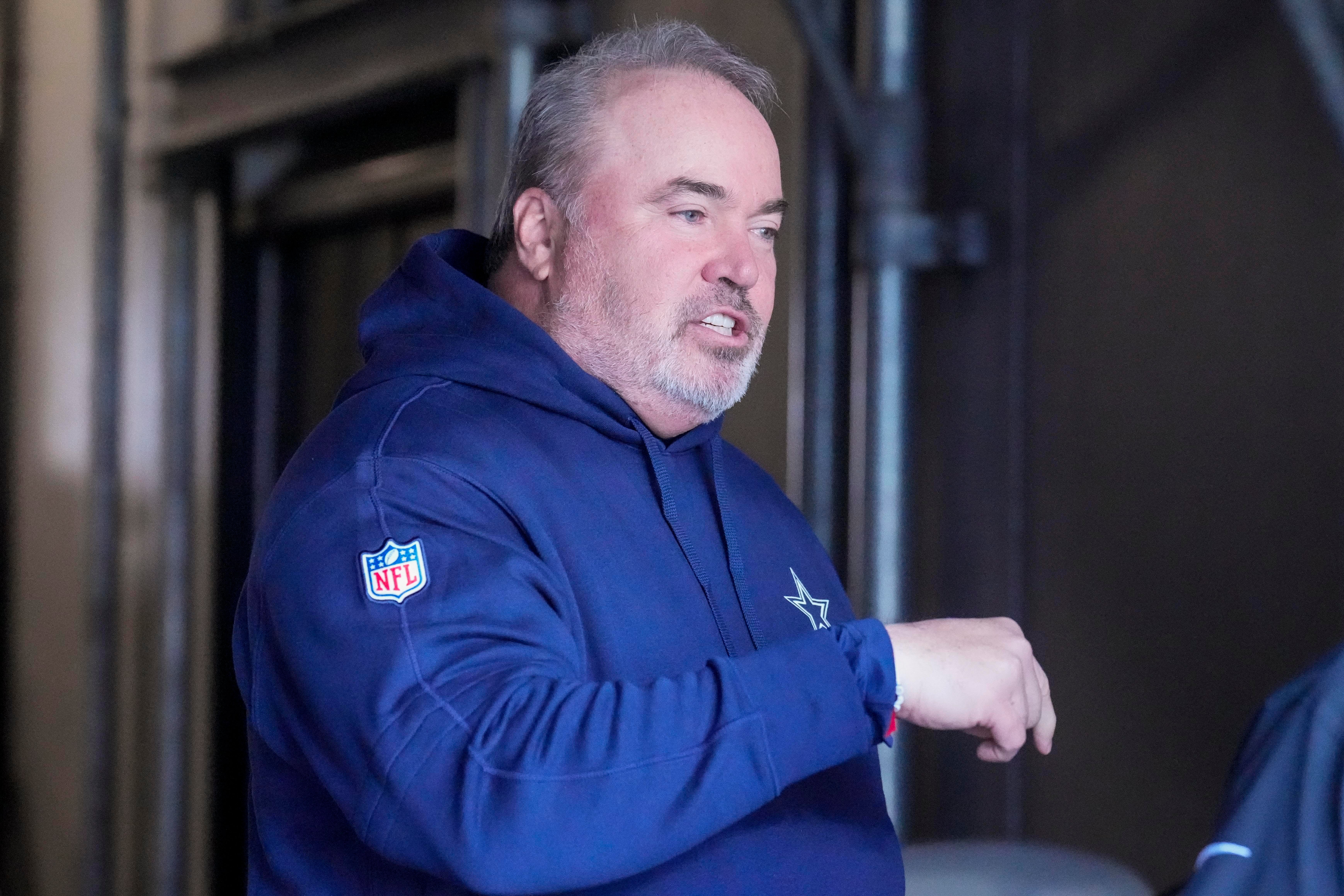 Dallas Cowboys Coach Mike McCarthy during pregame warm ups against the Carolina Panthers at Bank of America Stadium.