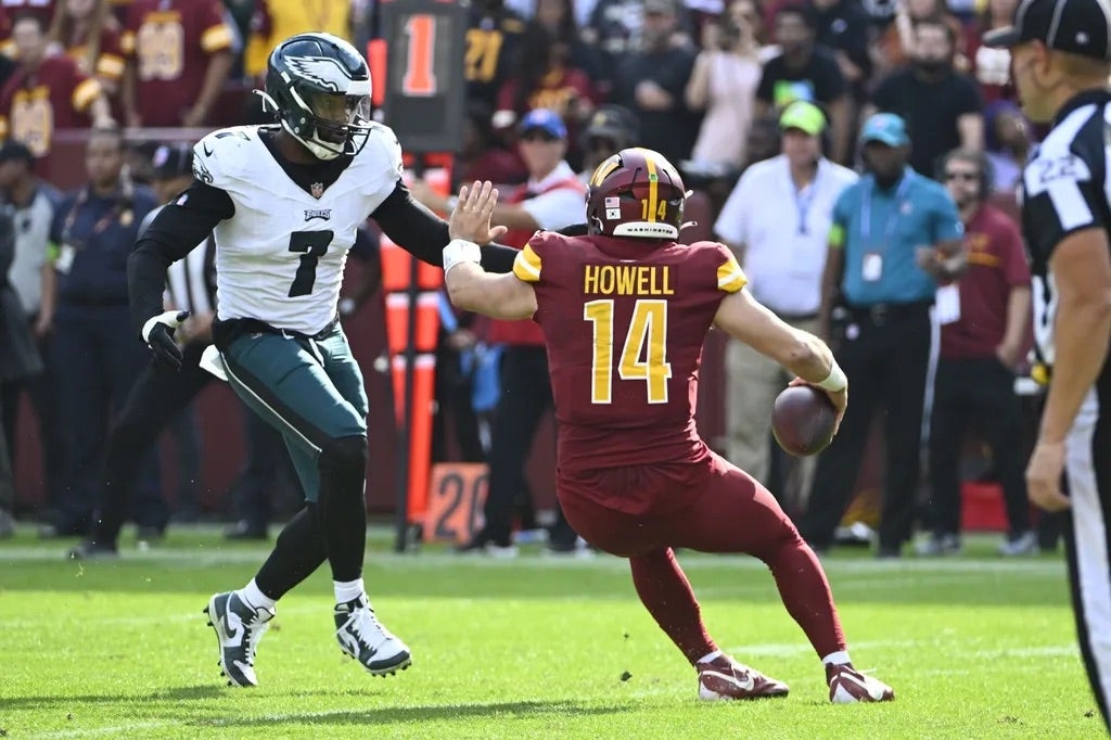 Philadelphia Eagles linebacker Haason Reddick (7) rushes Washington Commanders quarterback Sam Howell (14) during the second half at FedExField.