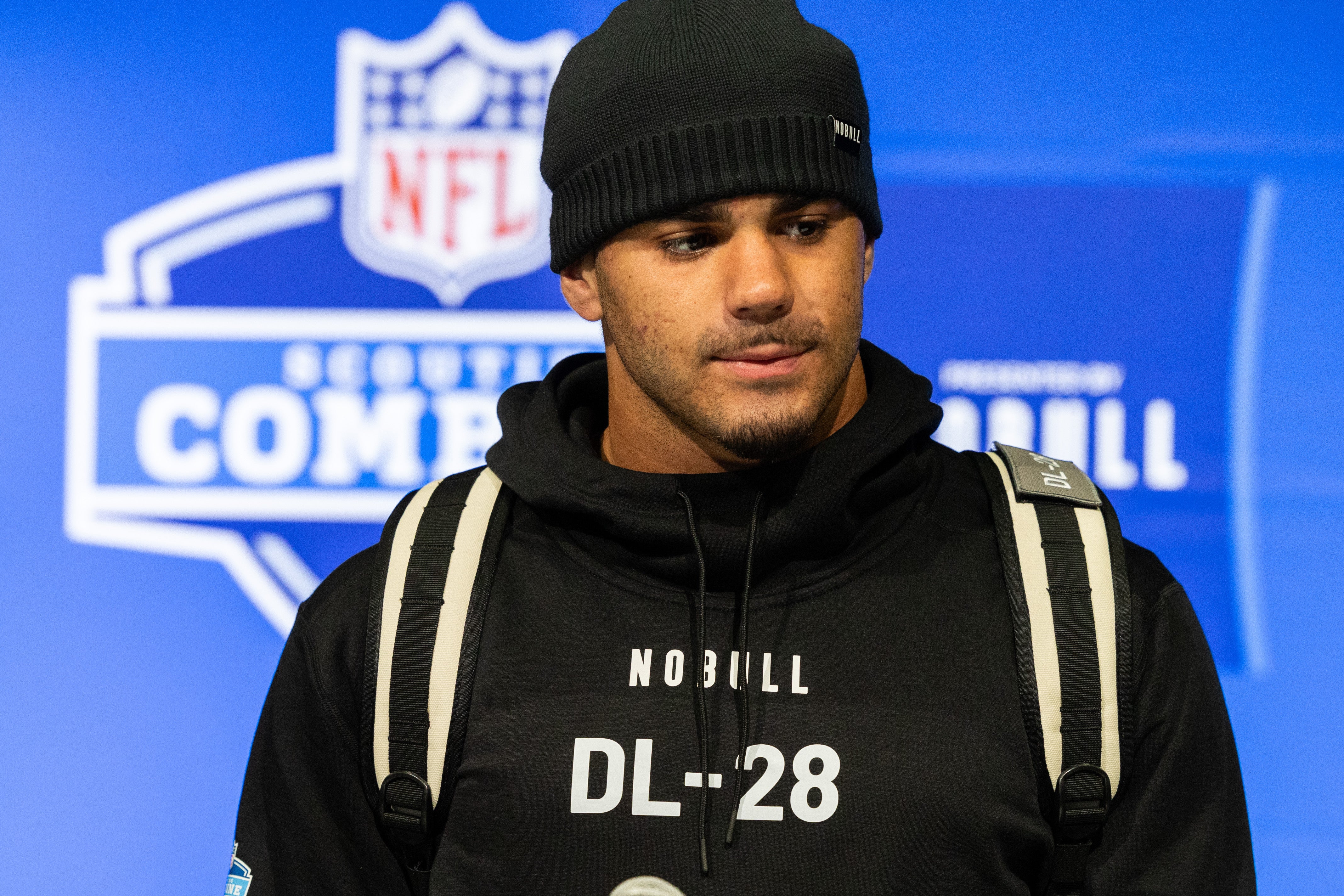 Feb 28, 2024; Indianapolis, IN, USA; Kansas defensive lineman Austin Booker (DL28) talks to the media at the 2024 NFL Combine at Indiana Convention Center.