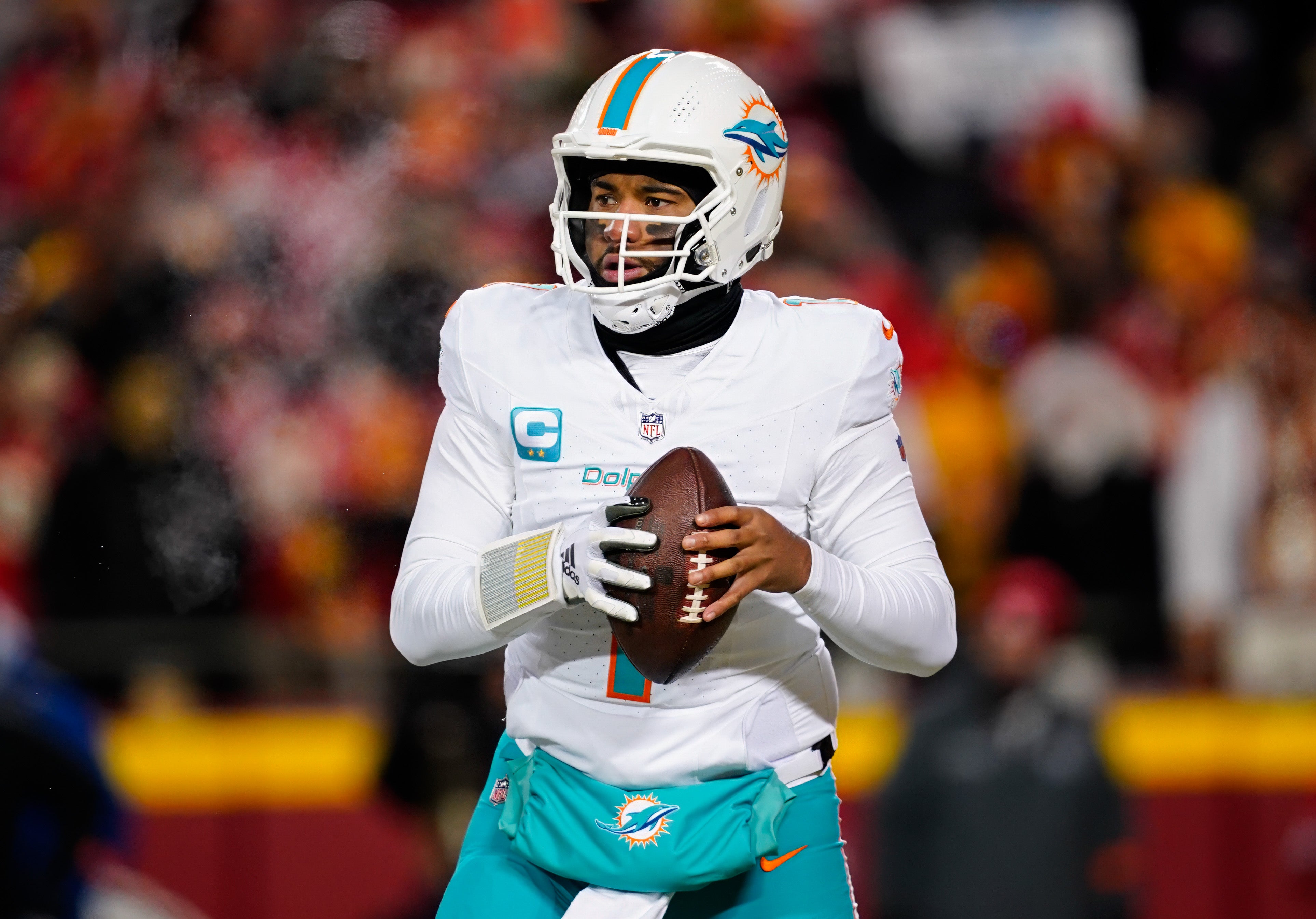 Miami Dolphins quarterback Tua Tagovailoa (1) during the first half of a 2024 AFC wild card game against the Kansas City Chiefs