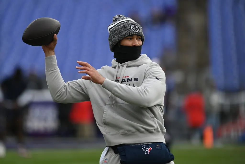 Houston Texans quarterback C.J. Stroud (7) warms up before a 2024 AFC divisional round game against the Baltimore Ravens at M&T Bank Stadium.