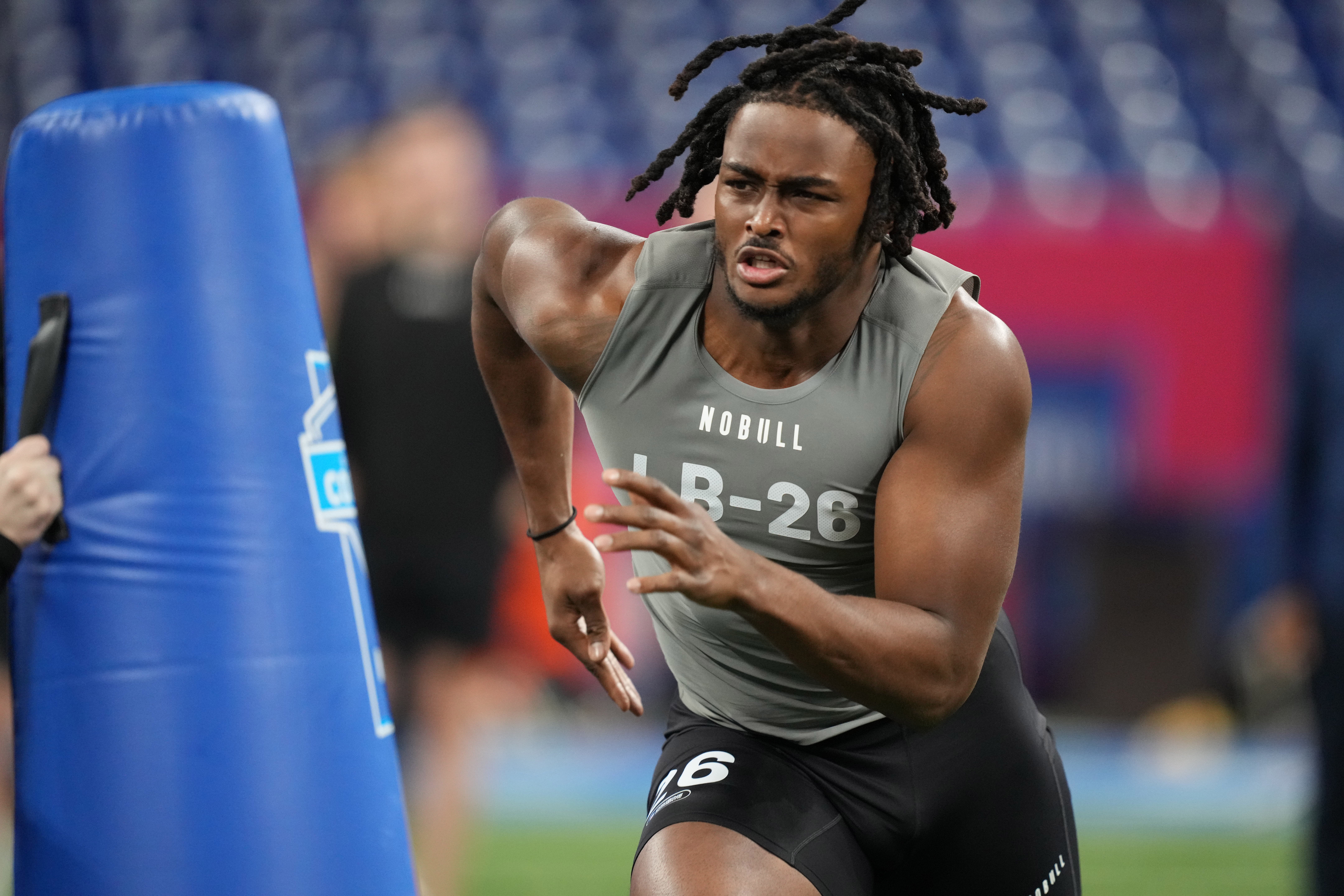 Feb 29, 2024; Indianapolis, IN, USA; Alabama linebacker Dallas Turner (LB26) works out during the 2024 NFL Combine at Lucas Oil Stadium.