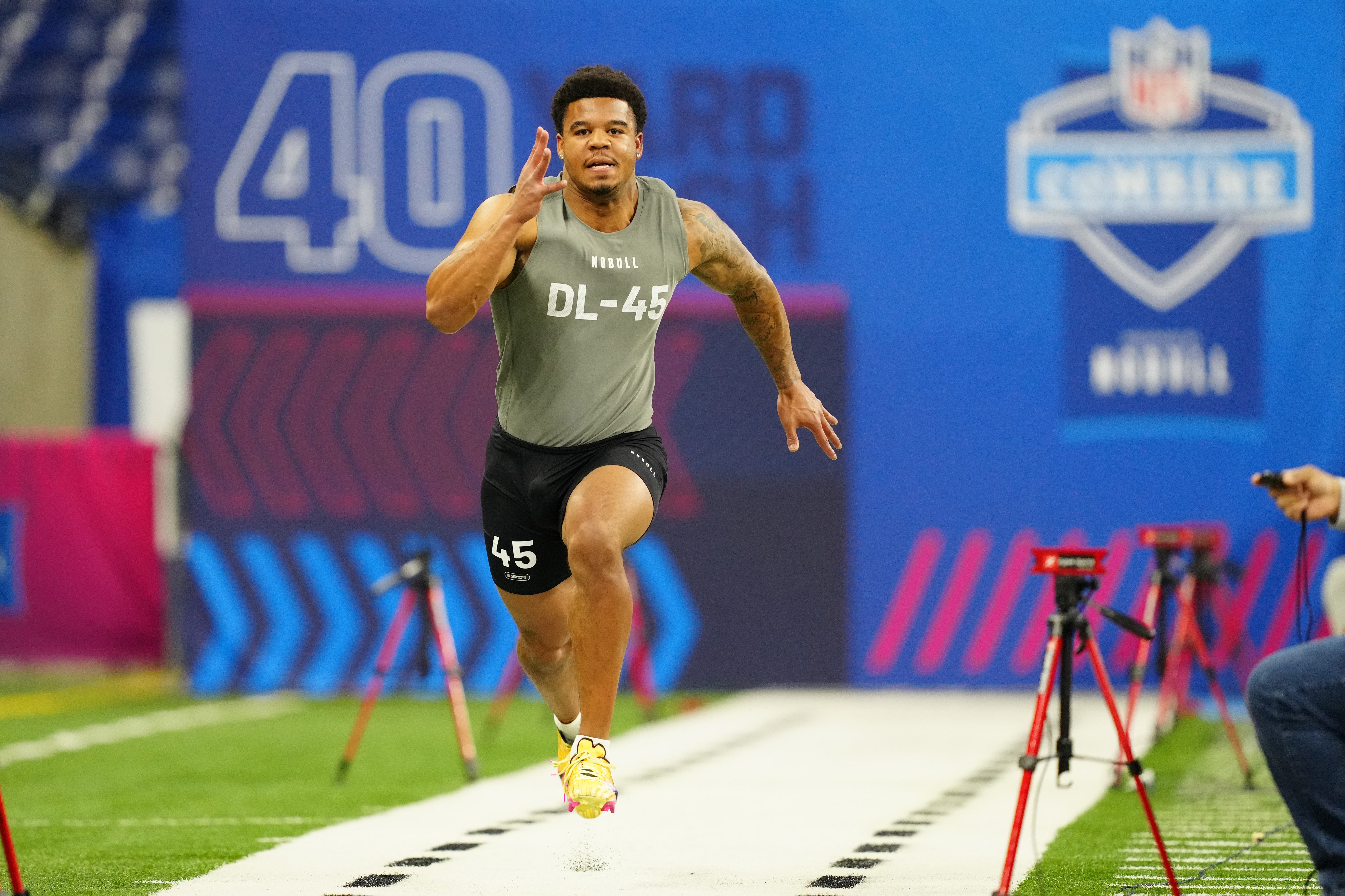 Feb 29, 2024; Indianapolis, IN, USA; Penn State defensive lineman Chop Robinson (DL45) works out during the 2024 NFL Combine at Lucas Oil Stadium.