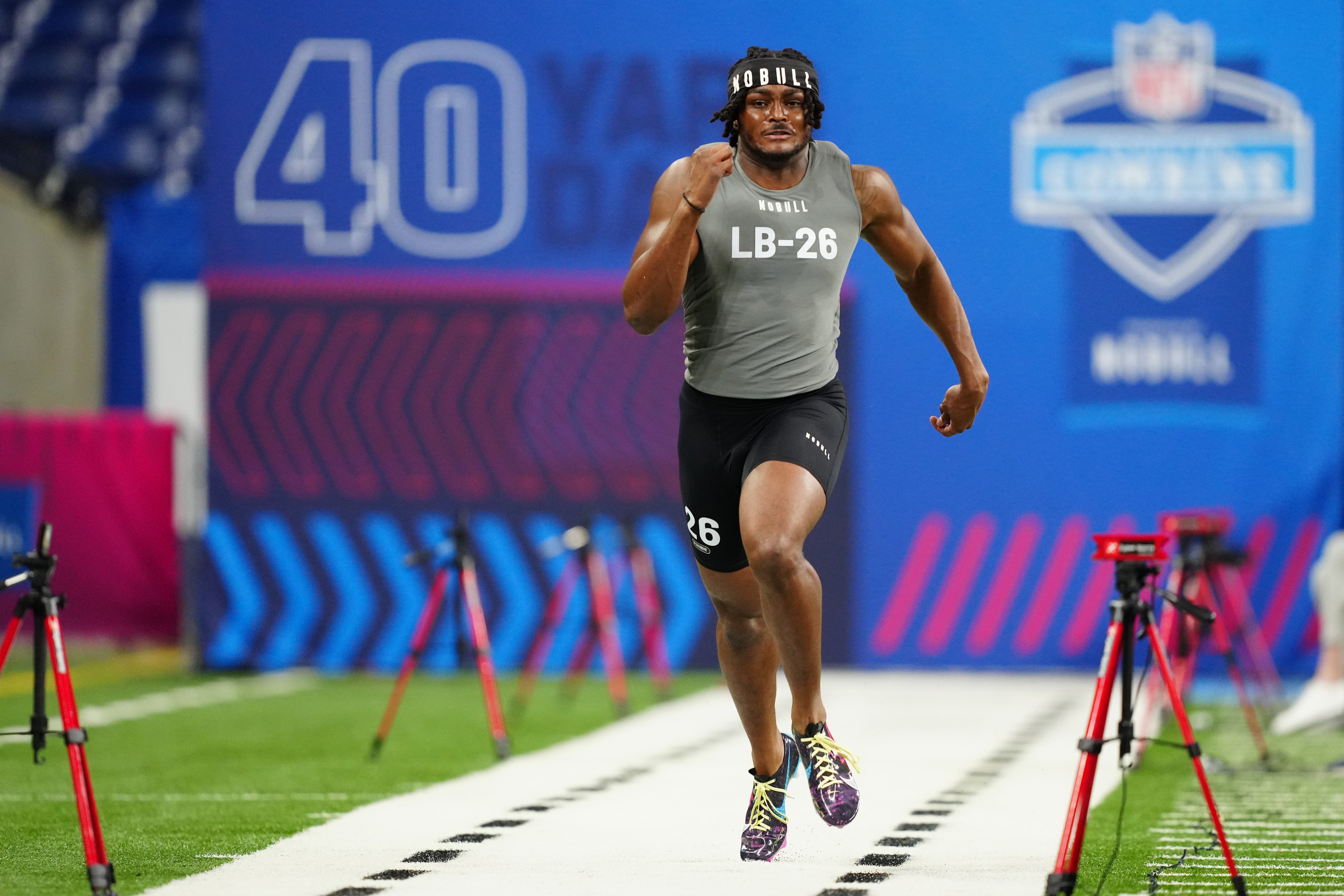 Feb 29, 2024; Indianapolis, IN, USA; Alabama linebacker Dallas Turner (LB26) works out during the 2024 NFL Combine at Lucas Oil Stadium. 