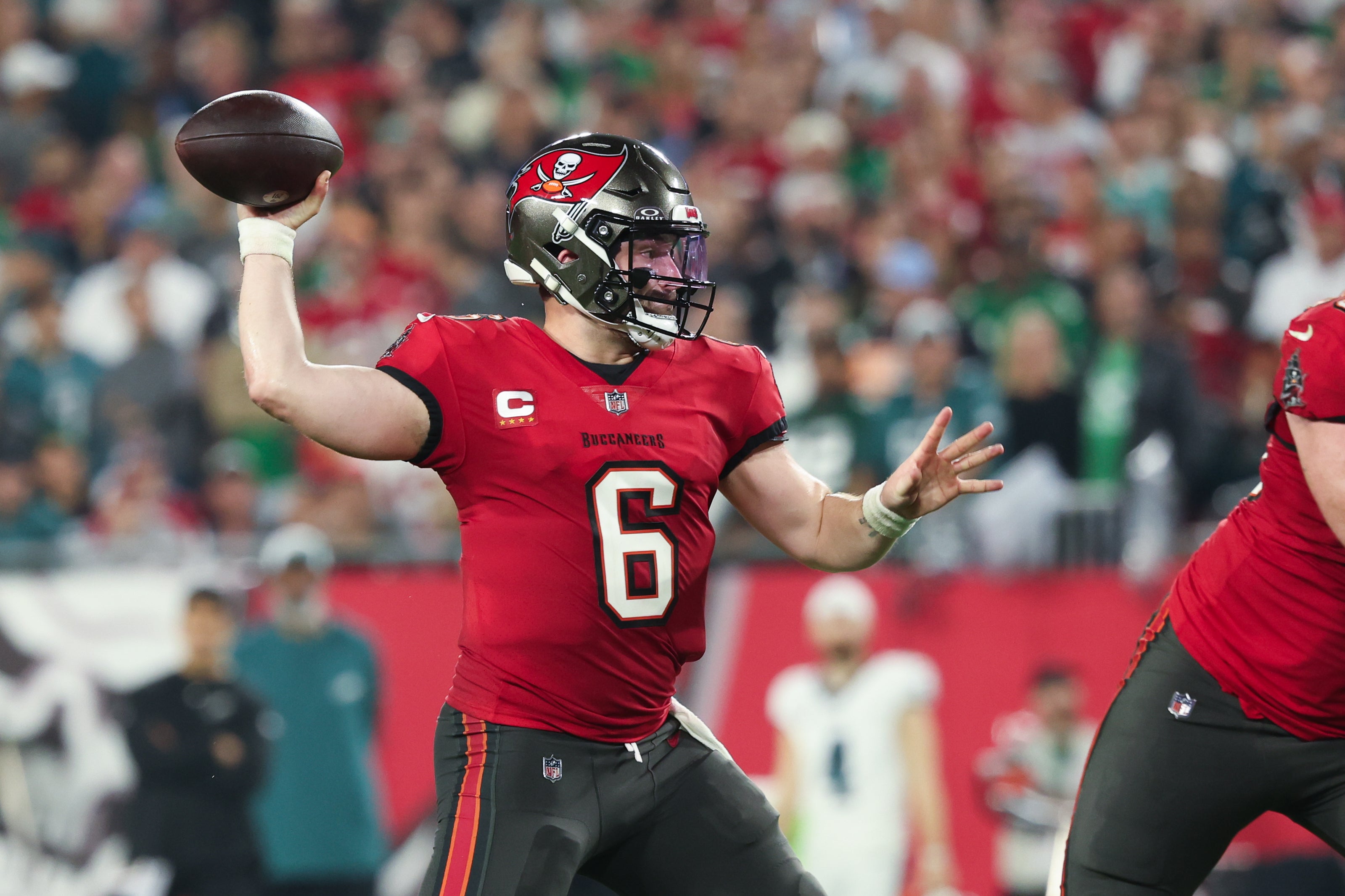 Jan 15, 2024; Tampa, Florida, USA; Tampa Bay Buccaneers quarterback Baker Mayfield (6) throws against the Philadelphia Eagles during the first half of a 2024 NFC wild card game at Raymond James Stadium