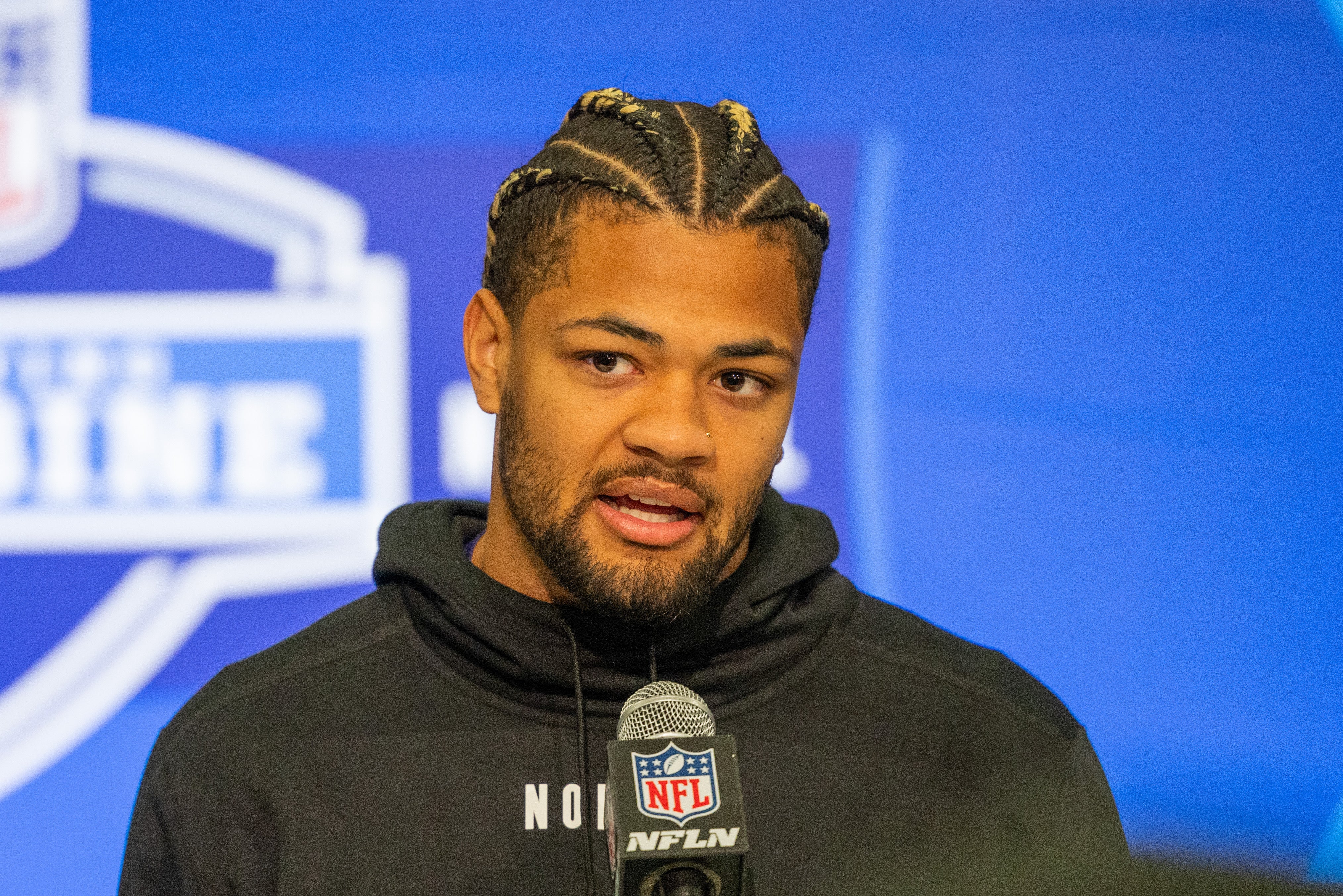 Washington wide receiver Rome Odunze (WO22) talks to the media during the 2024 NFL Combine at Lucas Oil Stadium. Trevor Ruszkowski-USA TODAY Sports