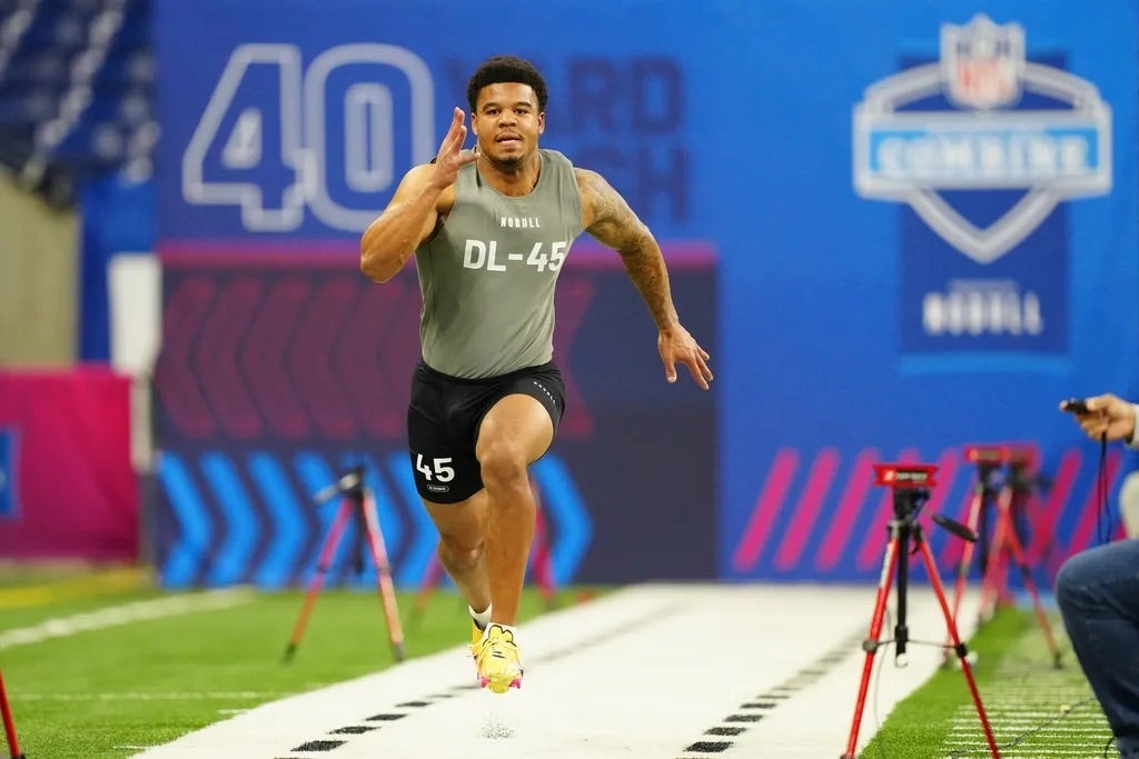 Penn State defensive lineman Chop Robinson (DL45) works out during the 2024 NFL Combine at Lucas Oil Stadium.