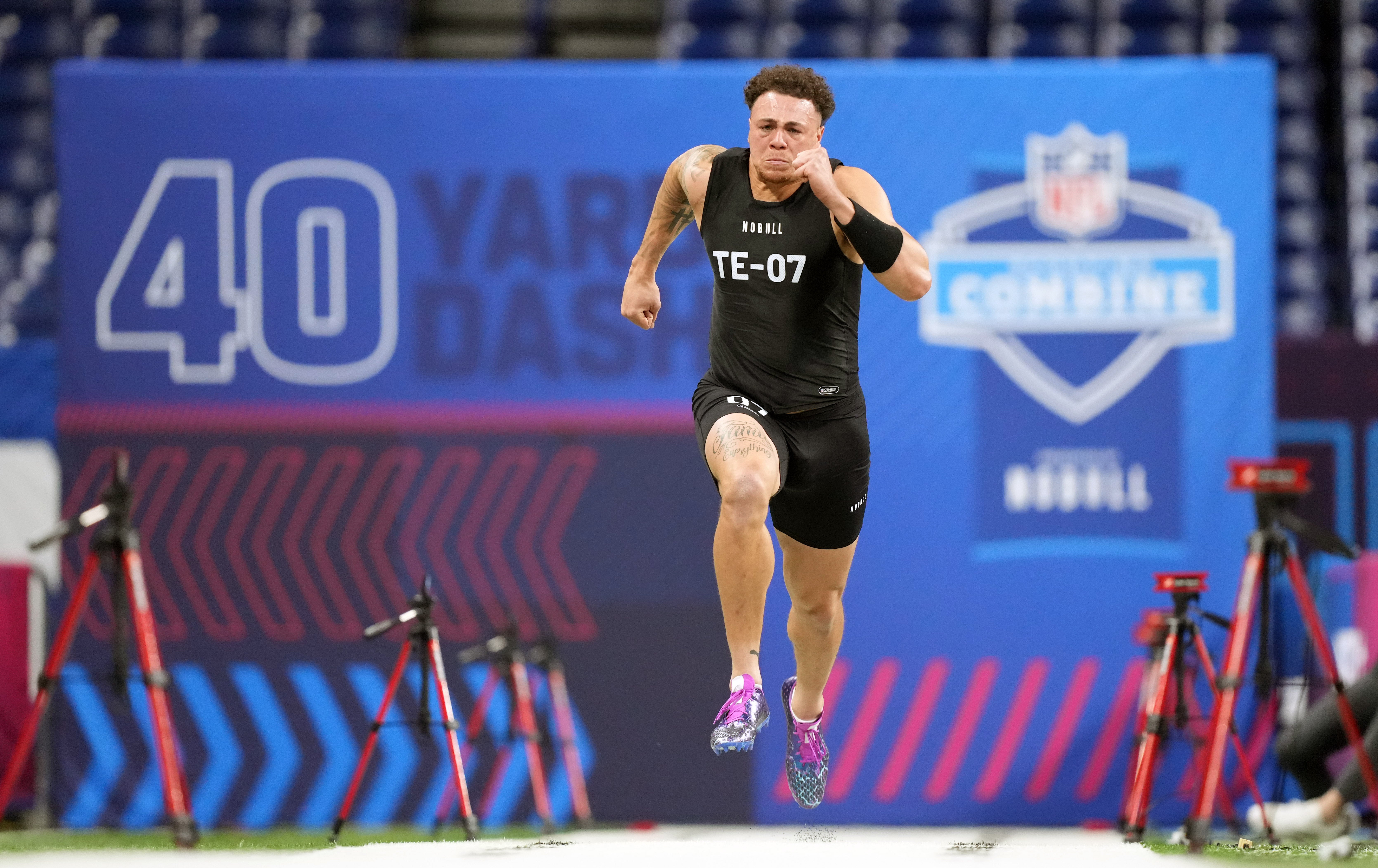 Mar 1, 2024; Indianapolis, IN, USA; Penn State tight end Theo Johnson (TE07) works out during the 2024 NFL Combine at Lucas Oil Stadium.