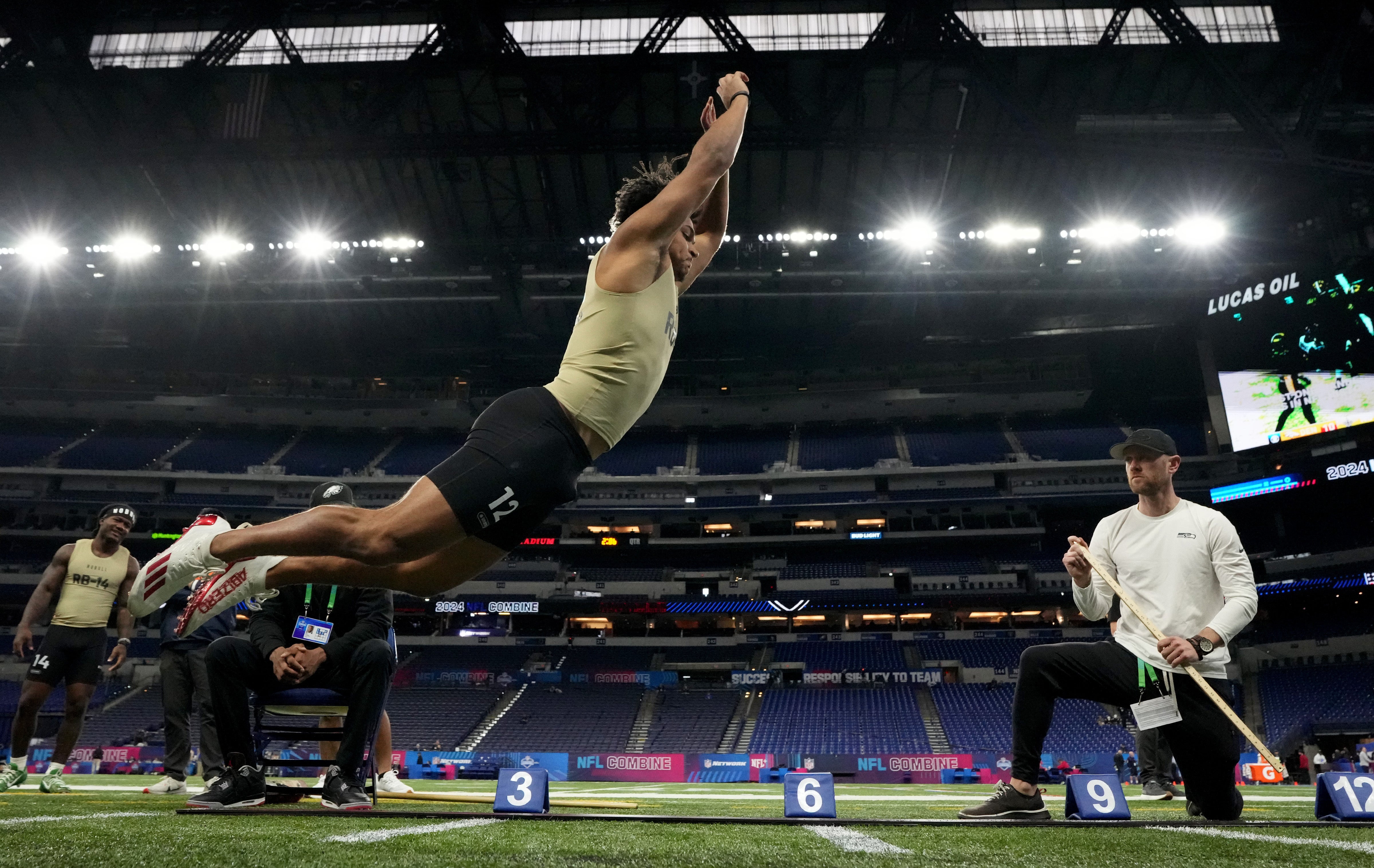 Mar 2, 2024; Indianapolis, IN, USA; Louisville running back Isaac Guerendo (RB12) during the 2024 NFL Combine at Lucas Oil Stadium.