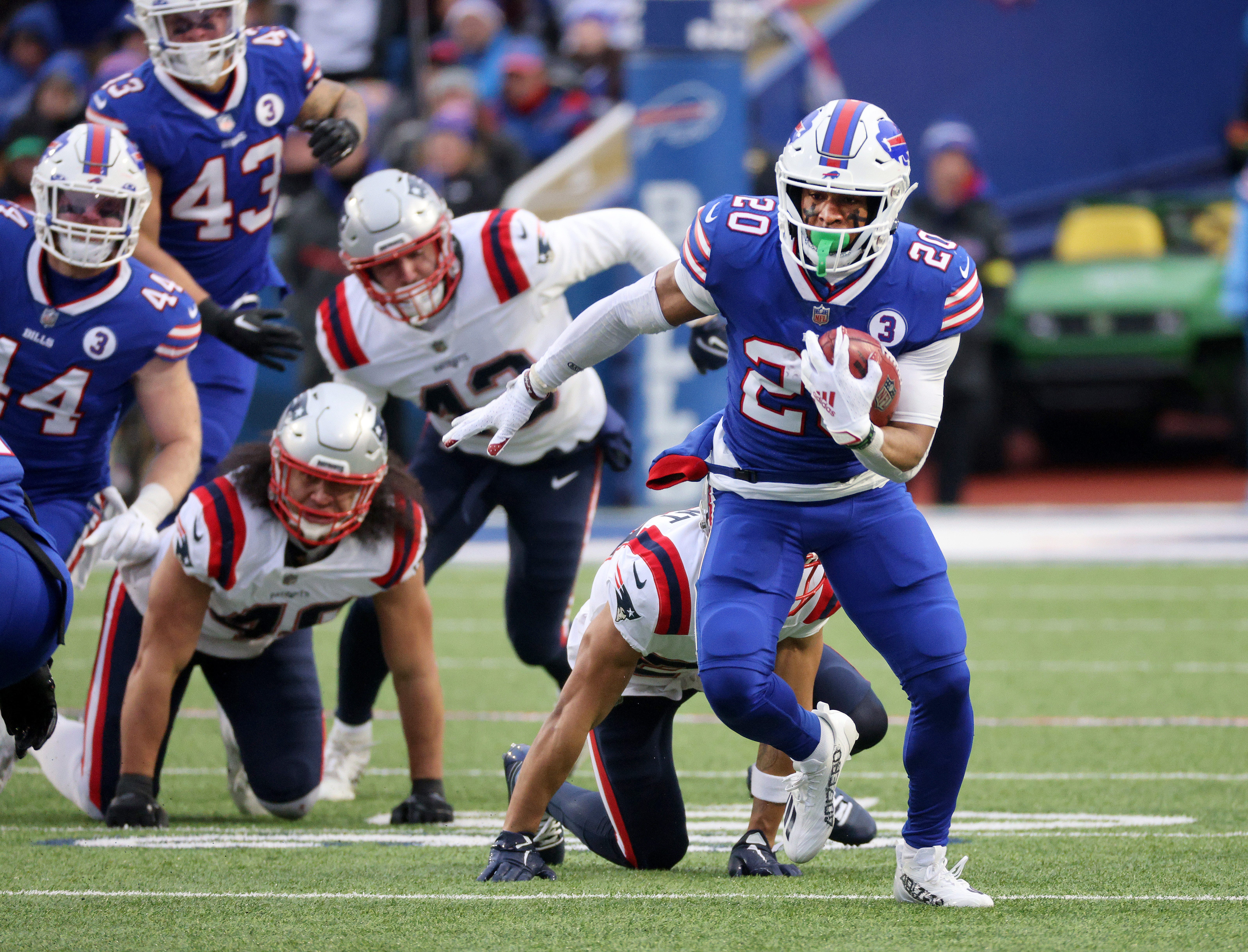 The Bills' Nyheim Hines breaks a tackle by New England s Jahlani Tavai on this 101-yard kickoff return. It was Hines' second kickoff return for a touchdown in the 35-23 Buffalo win.