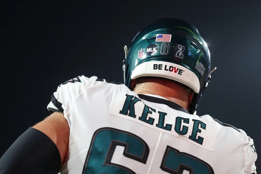 Philadelphia Eagles center Jason Kelce (62) wears an MLK sticker on his helmet in observance of Martin Luther King Jr. Day before a a 2024 NFC wild card game against the Tampa Bay Buccaneers.