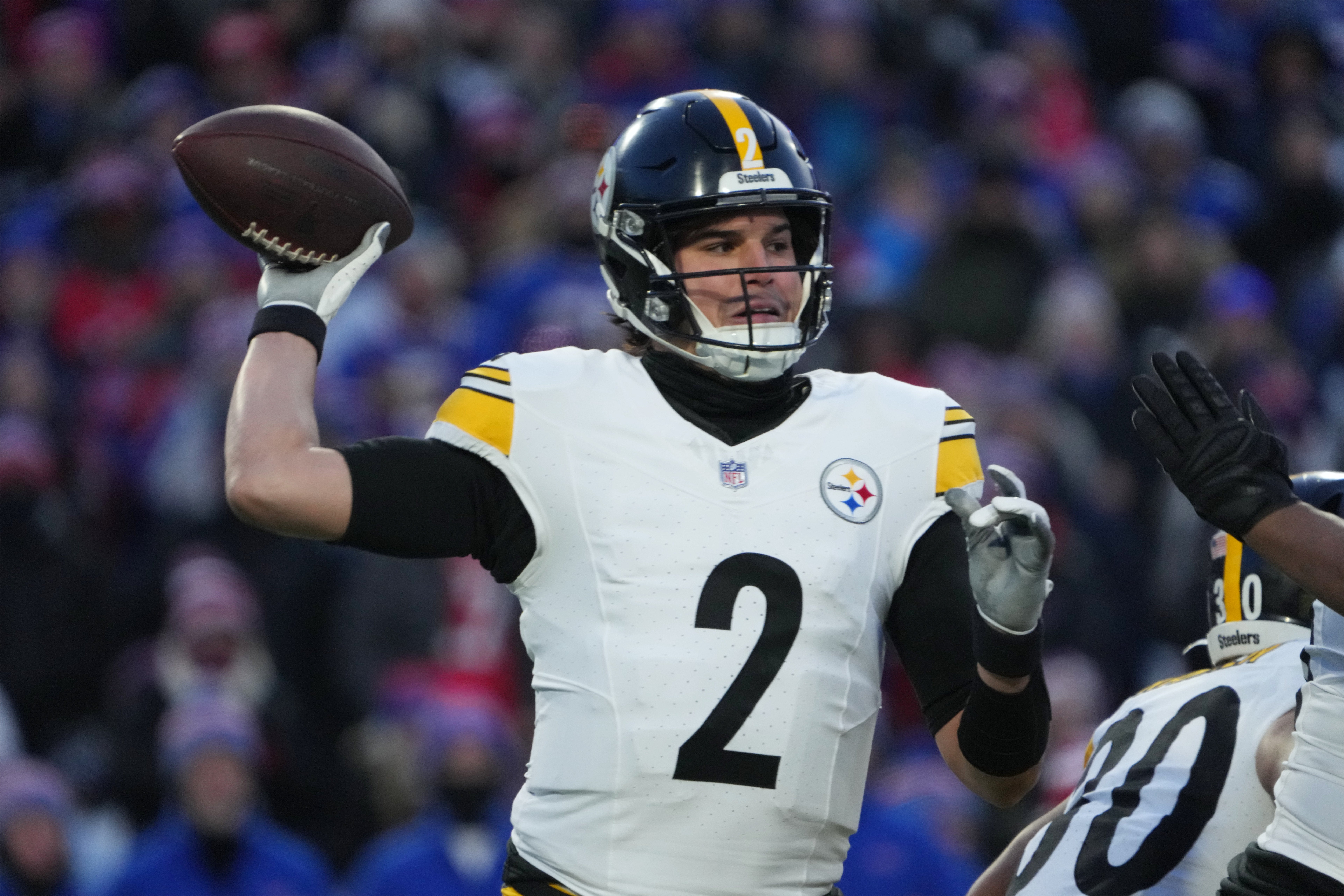 Jan 15, 2024; Orchard Park, New York, USA; Pittsburgh Steelers quarterback Mason Rudolph (2) throws the ball in the first half against the Buffalo Bills in a 2024 AFC wild card game at Highmark Stadium. Mandatory Credit: Kirby Lee-USA TODAY Sports
