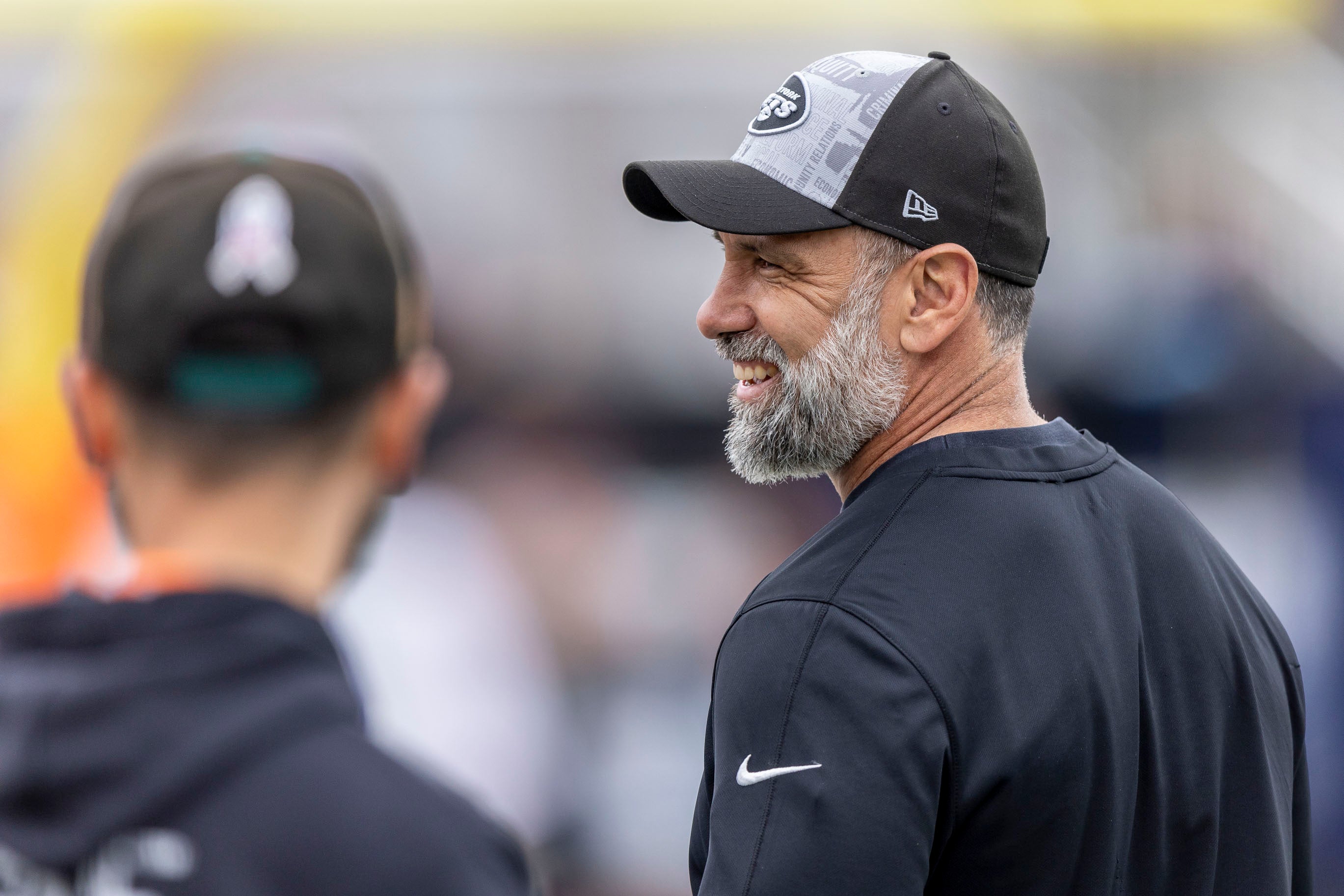 Feb 3, 2024; Mobile, AL, USA; National head coach Jeff Ulbrich of the New York Jets talks with staff during the first half of the 2024 Senior Bowl football game at Hancock Whitney Stadium.