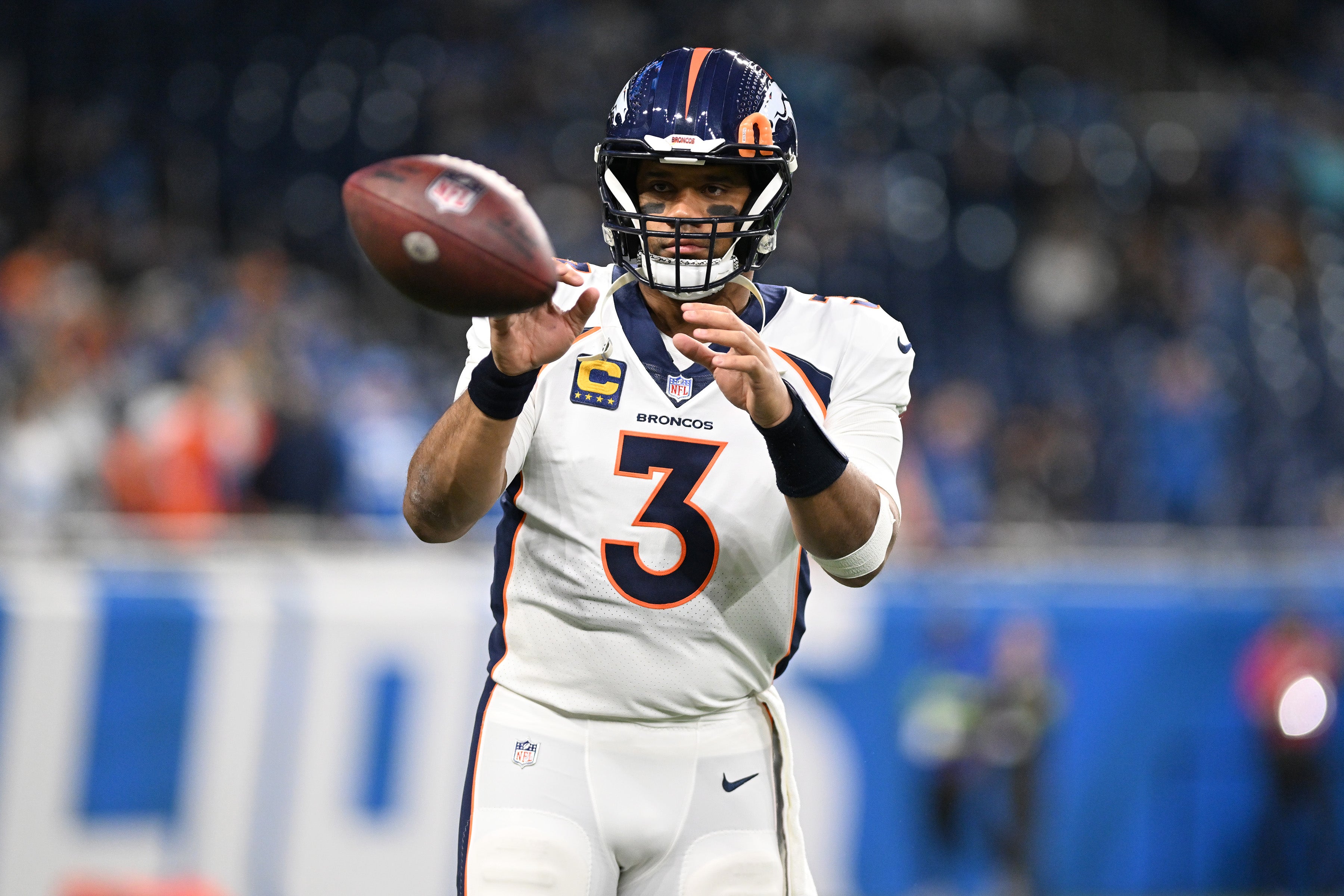 Dec 16, 2023; Detroit, Michigan, USA; Denver Broncos quarterback Russell Wilson (3) warms up before a game against the Detroit Lions at Ford Field. Mandatory Credit: Lon Horwedel-USA TODAY Sports  