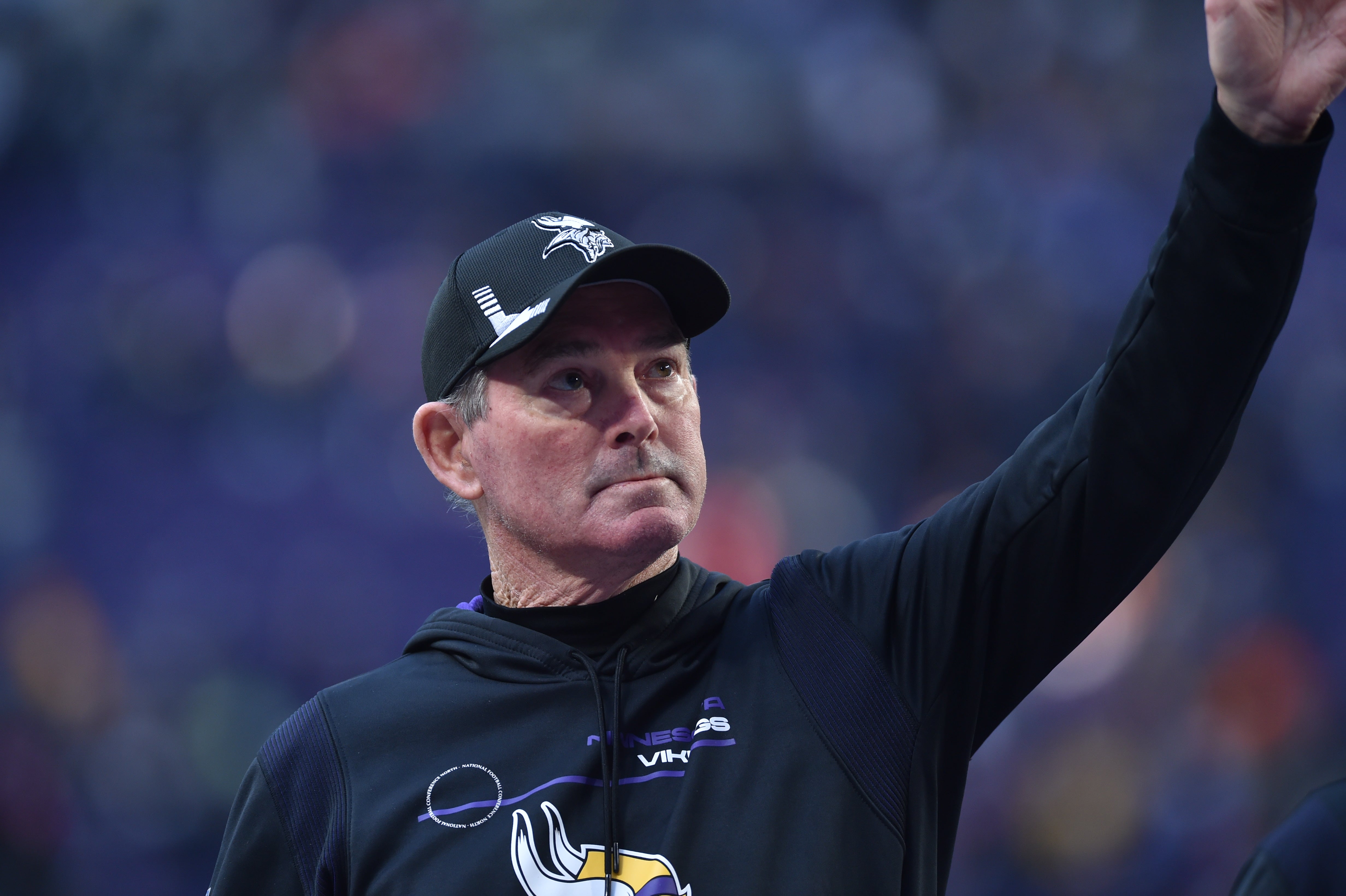 Minnesota Vikings head coach Mike Zimmer waves to the crowd after the game against the Chicago Bears at U.S. Bank Stadium.