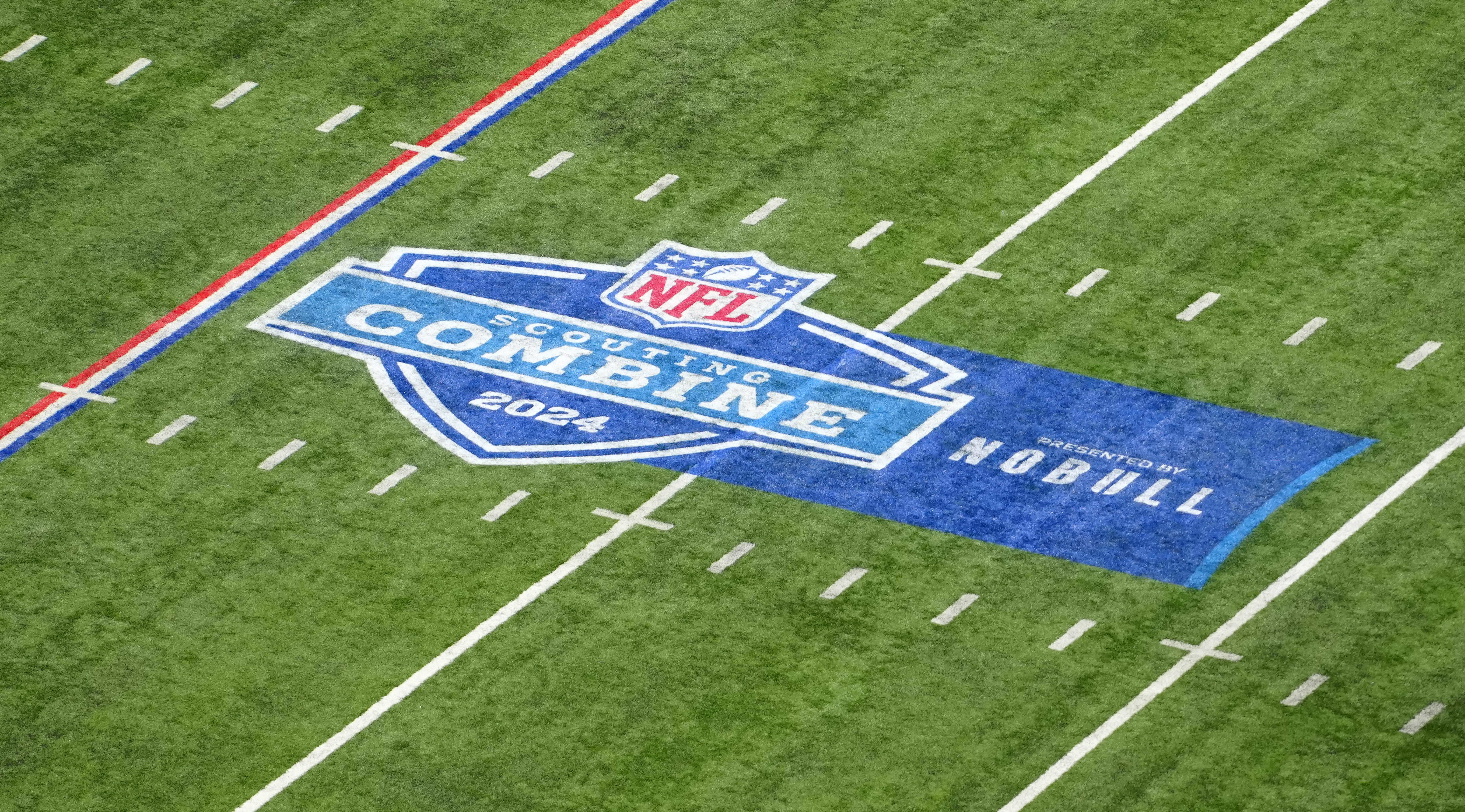 The 2024 NFL Scouting Combine logo on the field at Lucas Oil Stadium. Kirby Lee-USA TODAY Sports