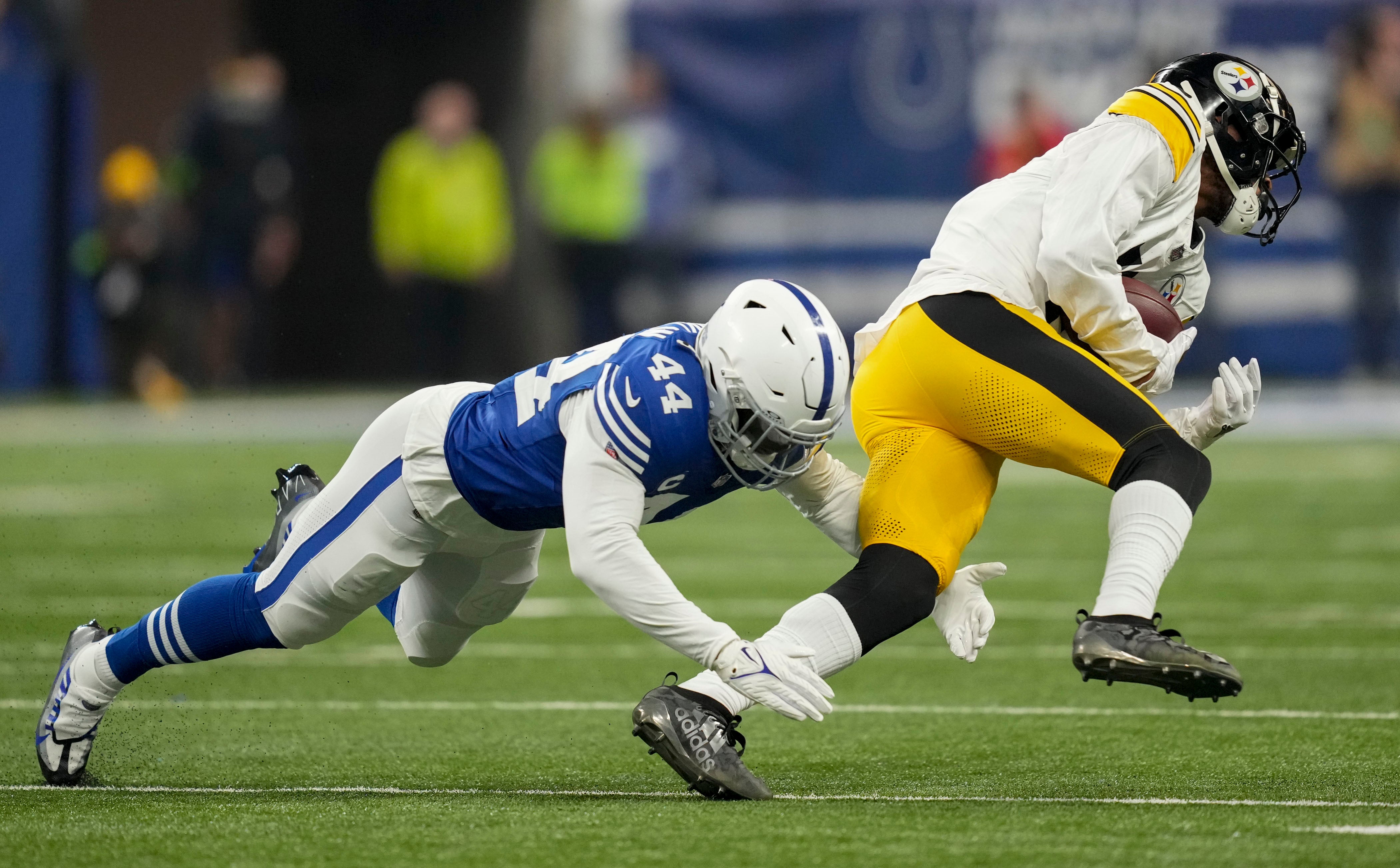 Dec 16, 2023; Indianapolis, Indiana, USA; Indianapolis Colts linebacker Zaire Franklin (44) misses a tackle on Pittsburgh Steelers wide receiver Allen Robinson II (11) during a game against the Pittsburgh Steelers at Lucas Oil Stadium. Mandatory Credit: Robert Scheer-USA TODAY Sports  