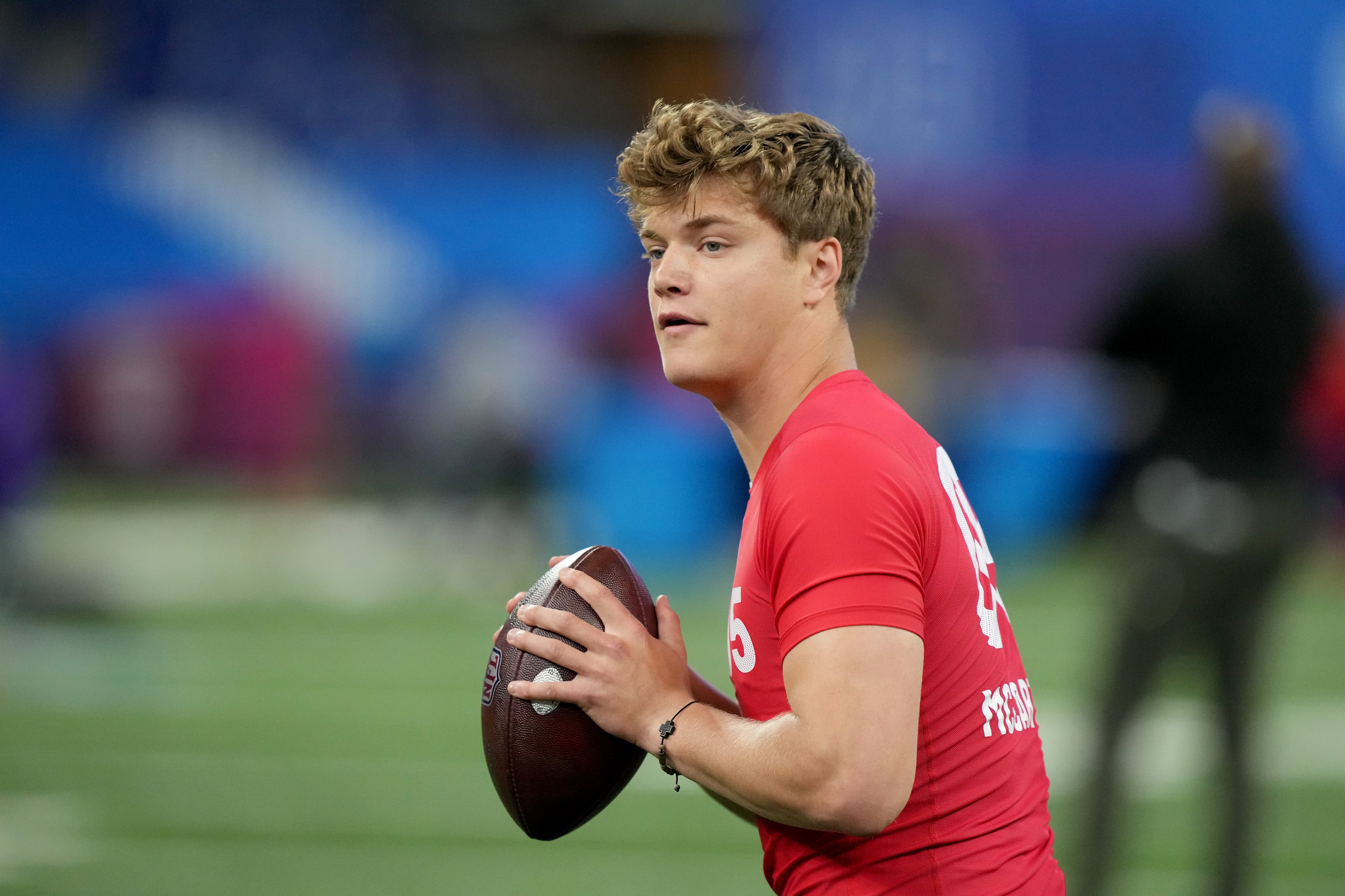 Mar 2, 2024; Indianapolis, IN, USA; Michigan quarterback J J McCarthy (QB05) during the 2024 NFL Combine at Lucas Oil Stadium.