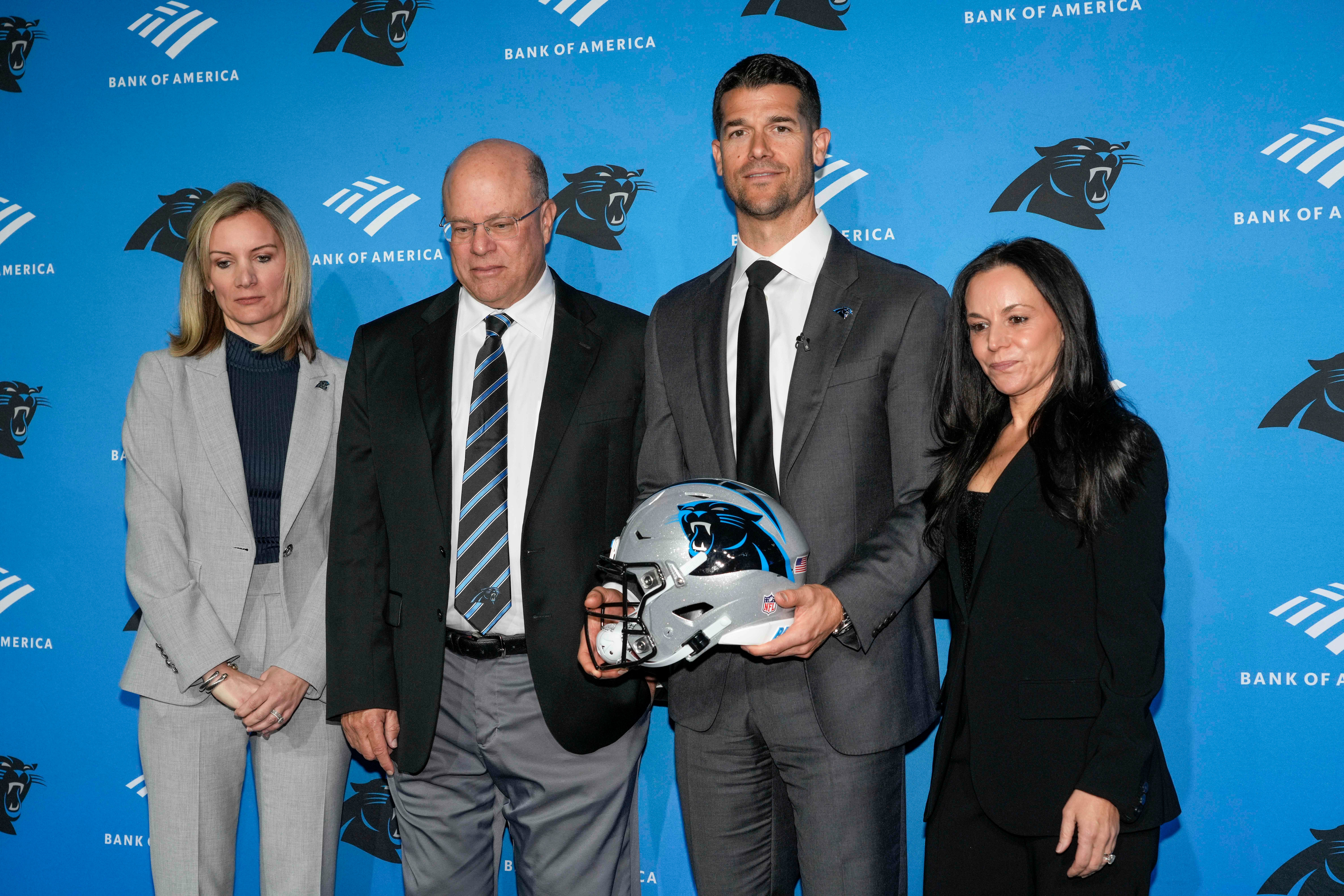 Feb 1, 2024; Charlotte, NC, USA; Carolina Panthers president Kristi Coleman, owner David Tepper, head coach Dave Canales, and CAO Niclole Tepper during the introductory press conference for new general manager Dan Morgan and head coach Dave Canales at Bank of America Stadium. Mandatory Credit: Jim Dedmon-USA TODAY Sports