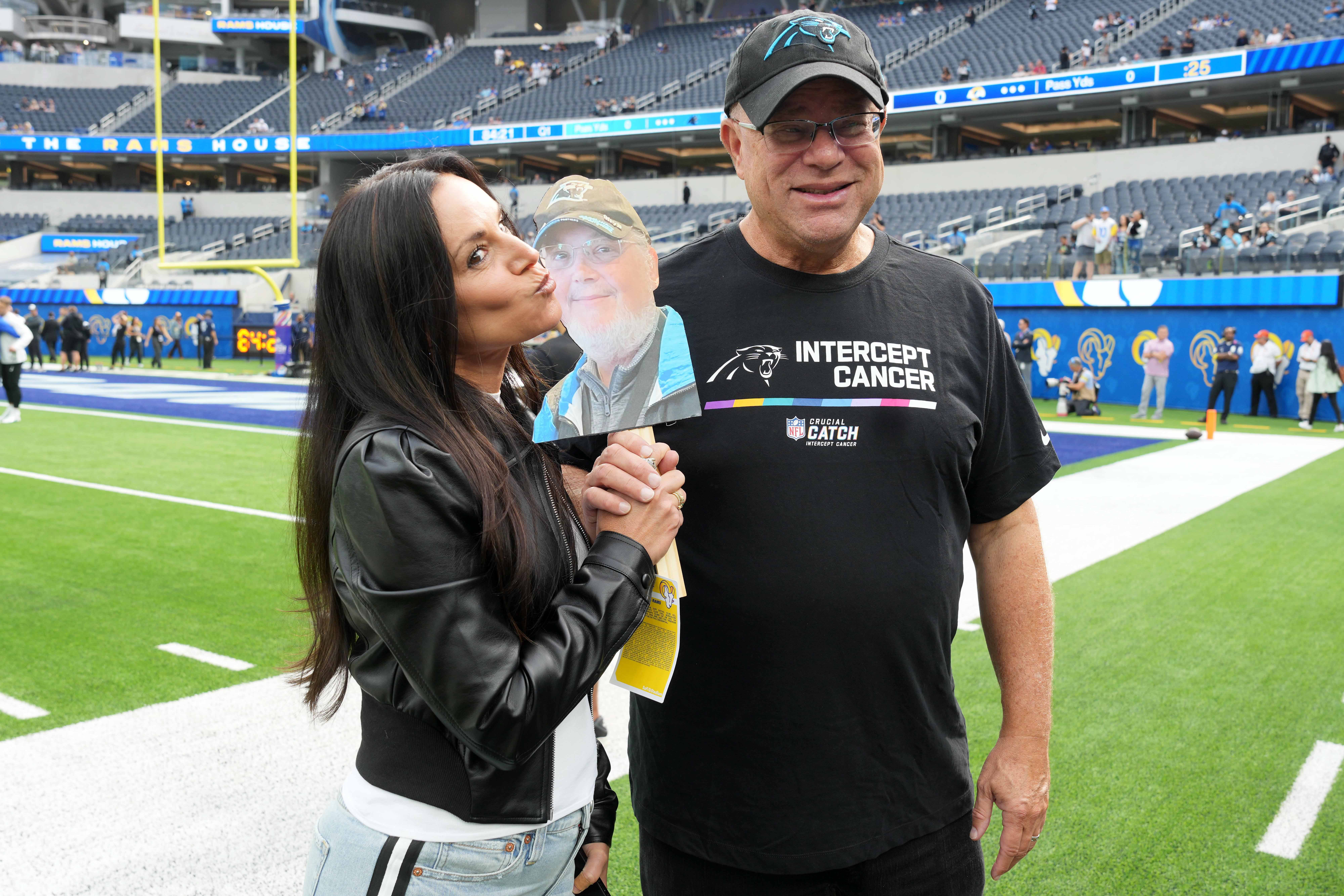 Oct 16, 2022; Inglewood, California, USA; Carolina Panthers owner David Tepper (right) and wife Nicole Tepper pose during the game against the Los Angeles Rams at SoFi Stadium. Mandatory Credit: Kirby Lee-USA TODAY Sports