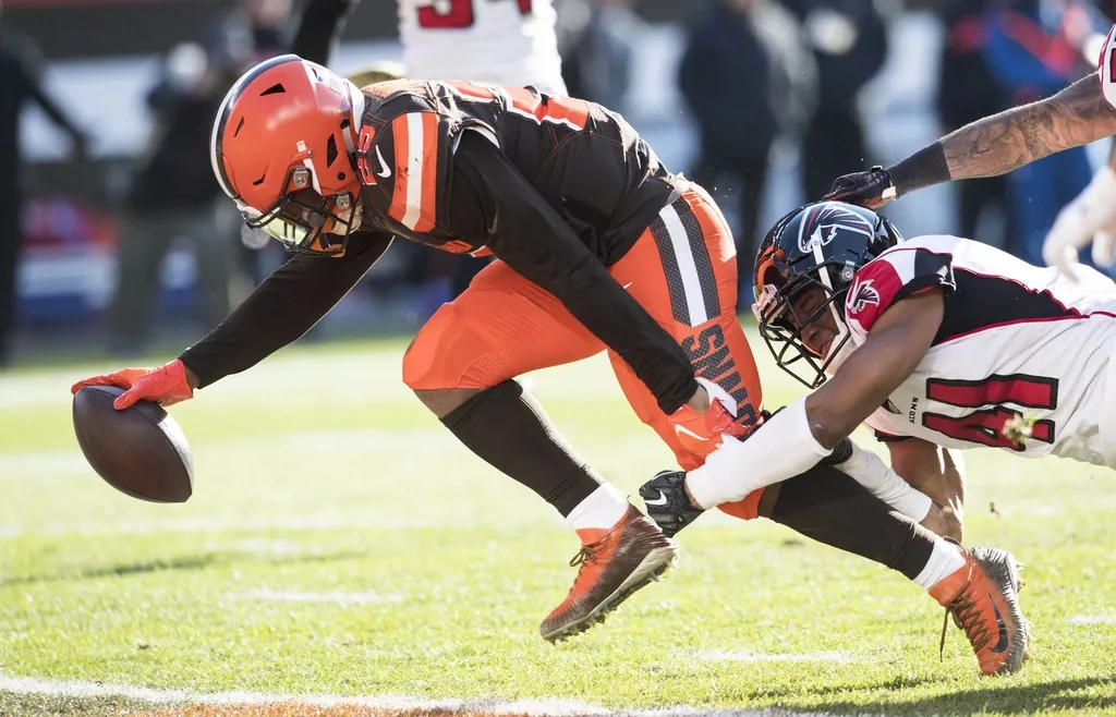 Cleveland Browns running back Duke Johnson (29) scores a touchdown as Atlanta Falcons defensive back Sharrod Neasman (41) goes for the tackle during the second half at FirstEnergy Stadium.